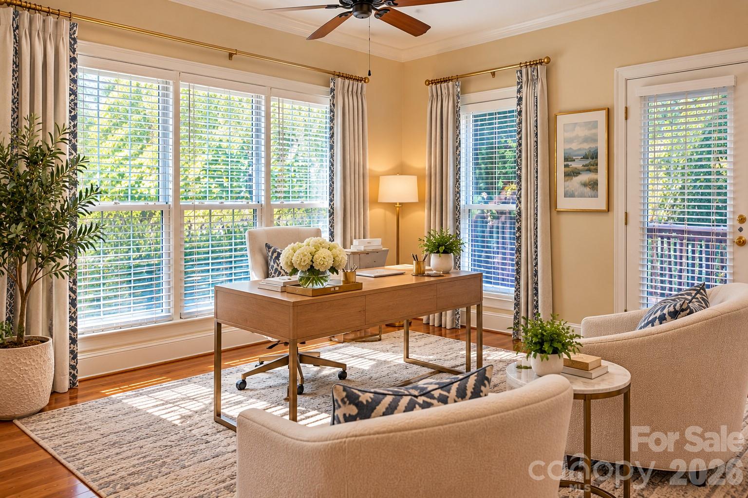 DIGITALLY STAGED mini office or sitting area in front of kitchen. Other idea: make this a play area for small children. Note One of 3 back deck Door access's to the right. - 5480 Glen Forest Drive, Charlotte