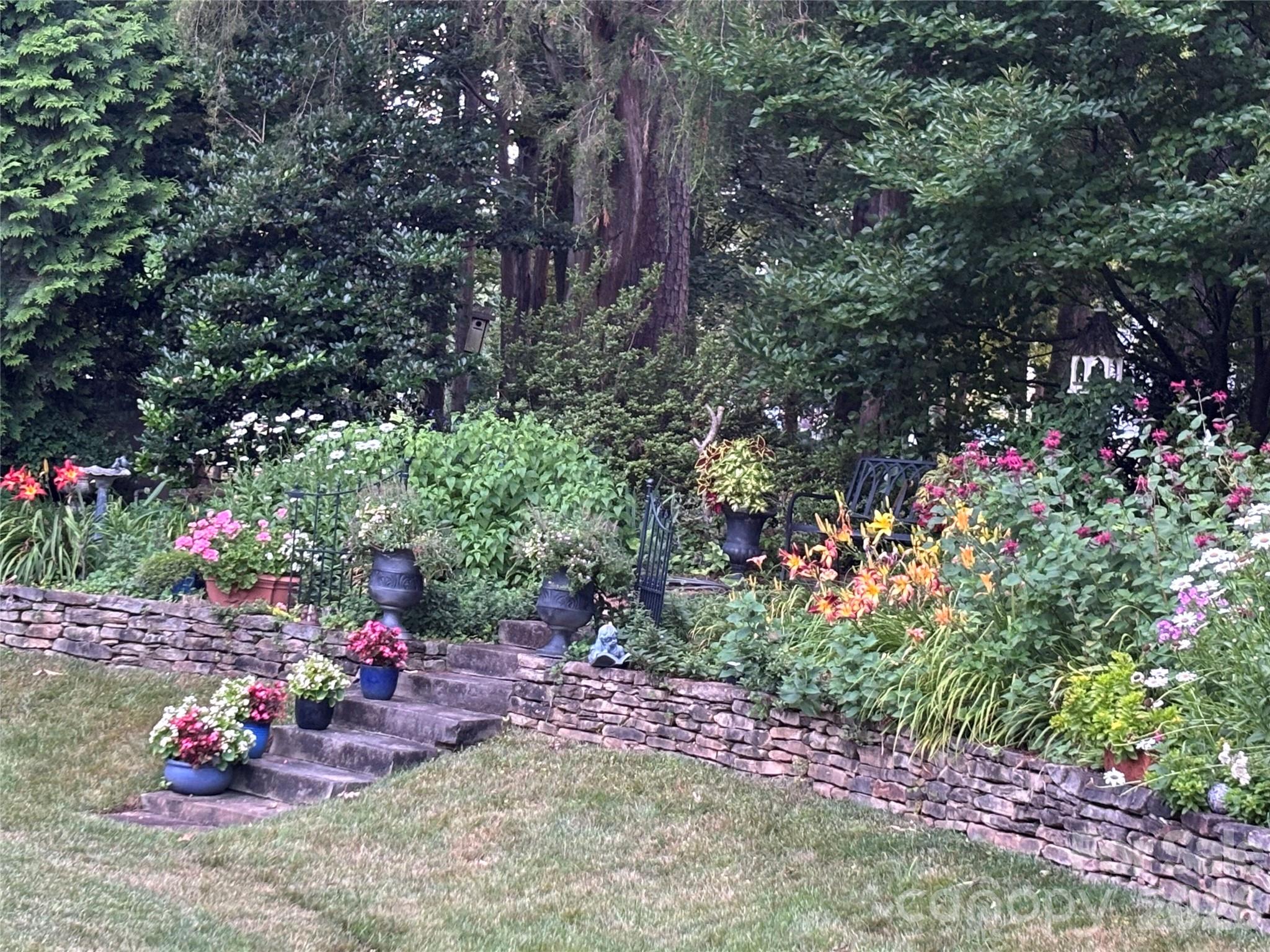 Beautiful perennial garden in full bloom - 2909 Donegal Drive, Kannapolis