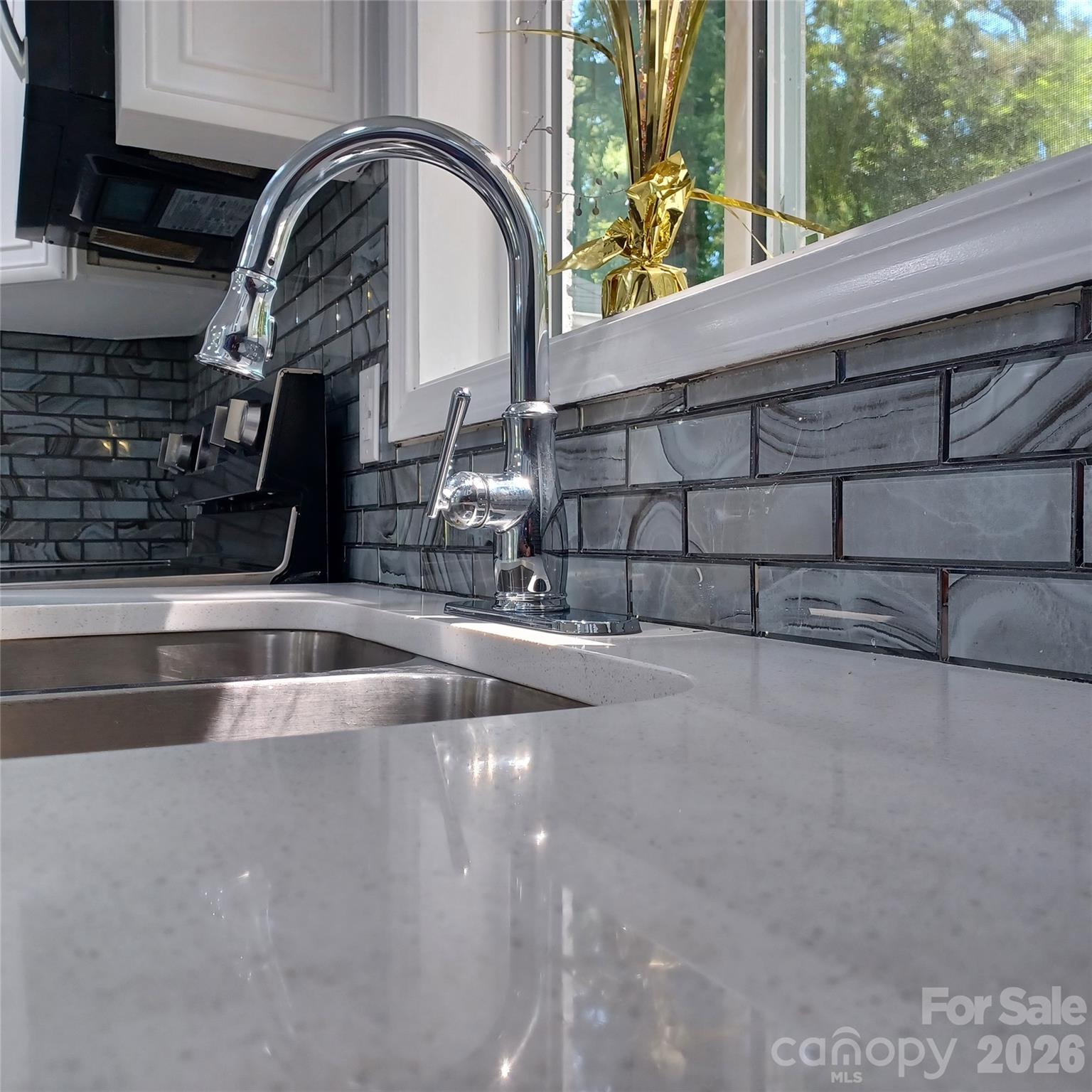 Beautiful countertops with undermount stainless sink - 5717 Ruth Drive, Charlotte