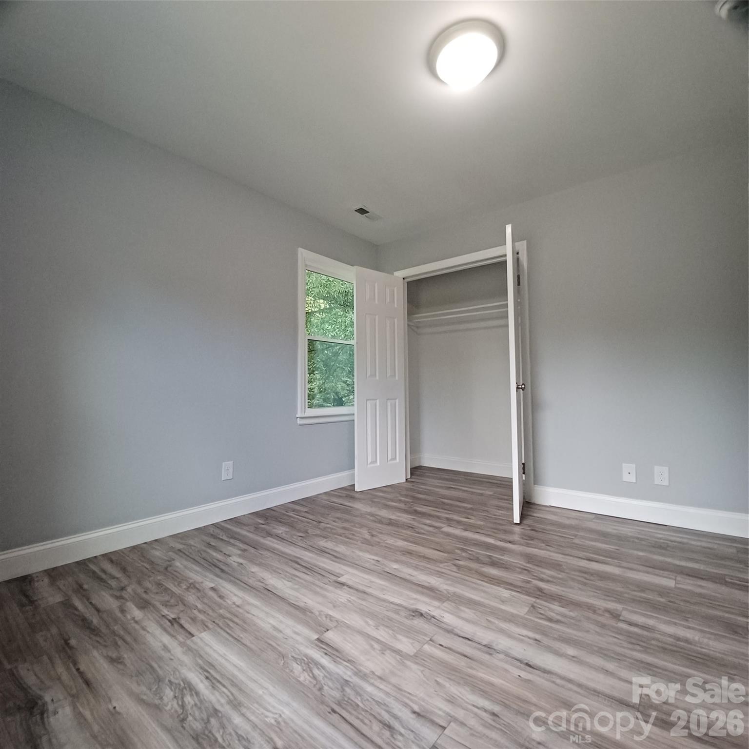 Corner secondary bedroom with double door closet - 5717 Ruth Drive, Charlotte