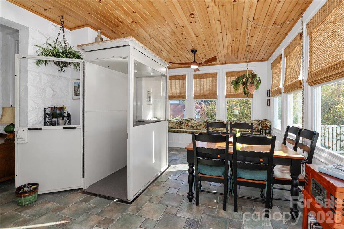 Sunroom with Elevator to Basement Garage - 403 W Front Street, Statesville