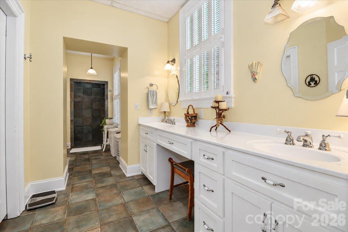 Primary Bathroom - Main Floor includes the laundry area. - 403 W Front Street, Statesville