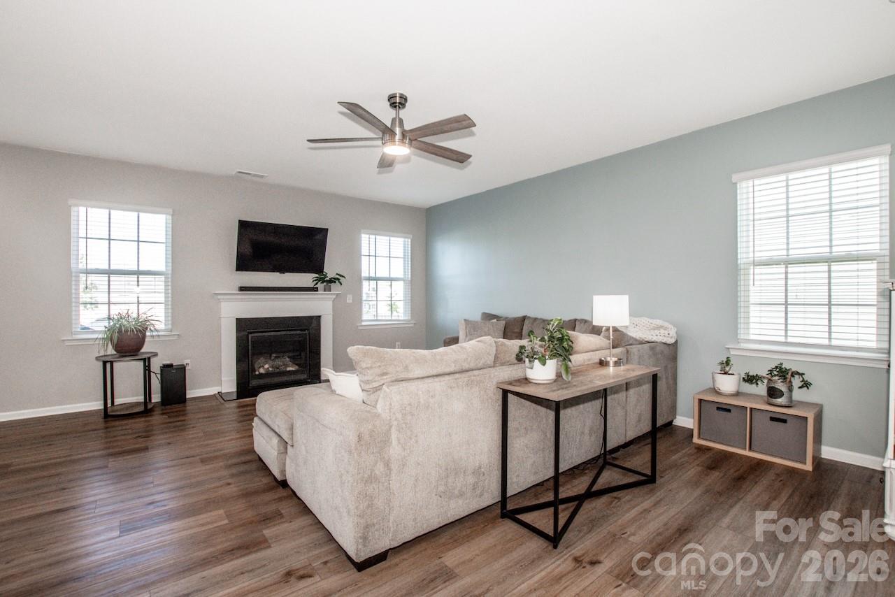 Great Room with Natural Gas Fireplace & neutral upgraded Sherwin Williams Paint - 1944 Lowland Shade Court, Maiden
