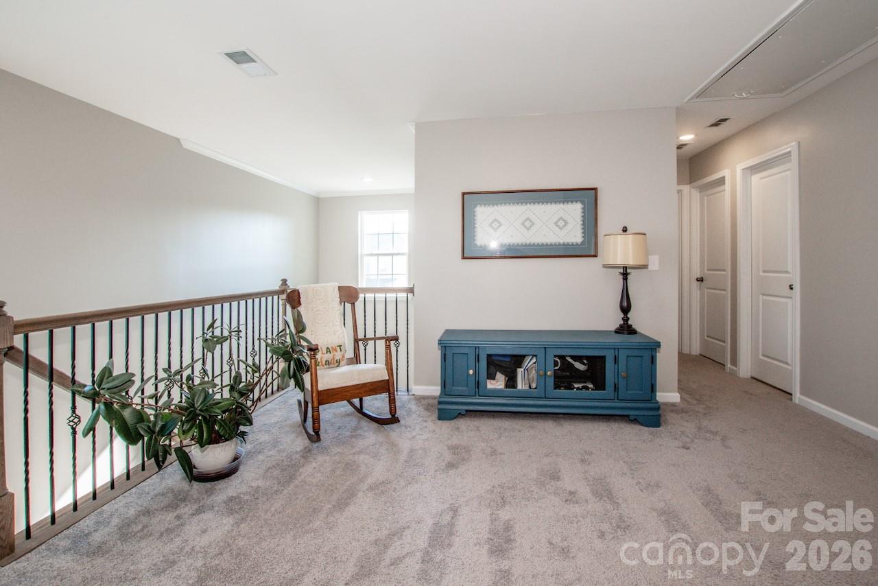 Spacious Loft Area can serve as a home office space, play area, flex space - 1944 Lowland Shade Court, Maiden
