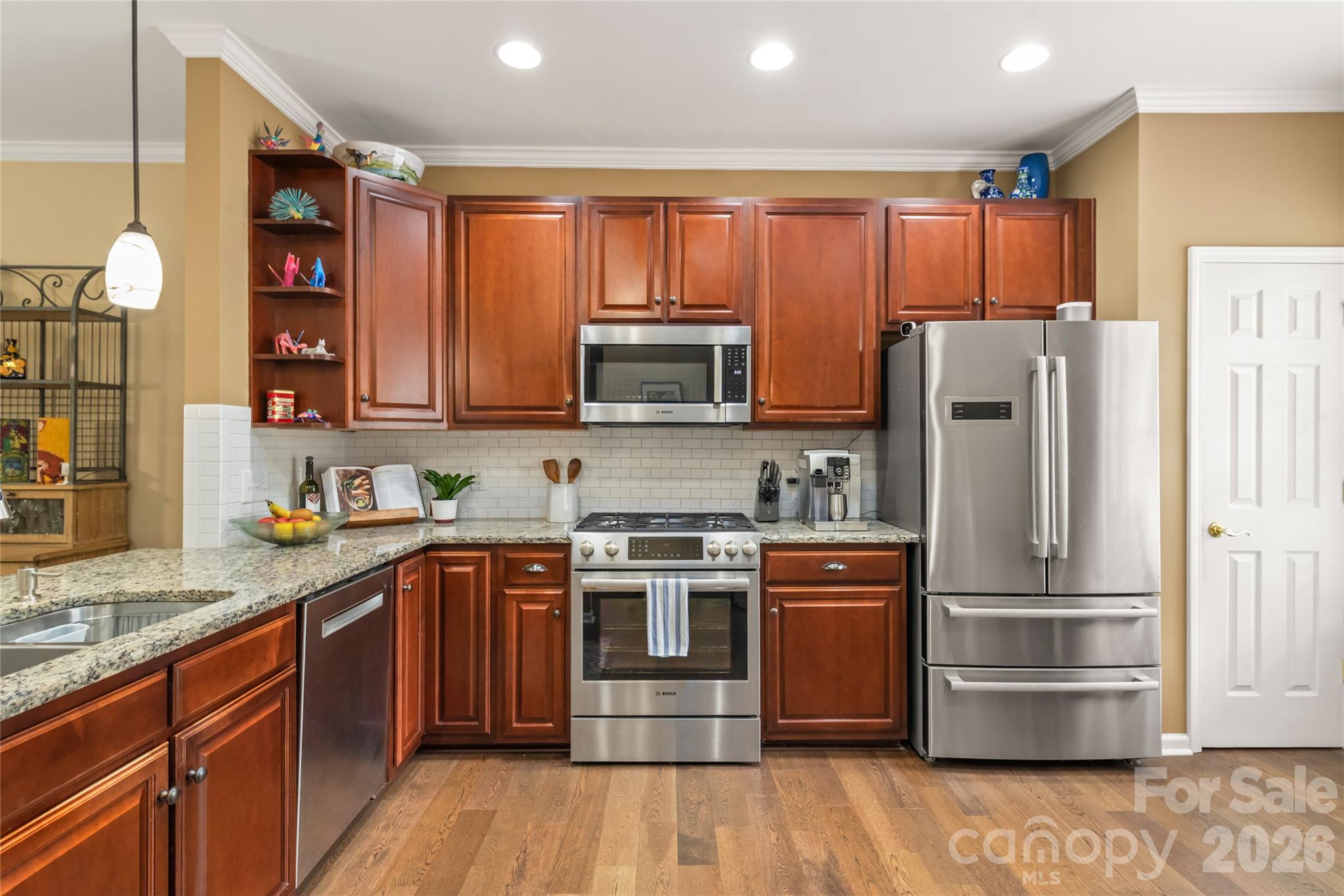 With an abundance of beautiful cabinet space in the kitchen, you’ll have a place for every pot, pan, and pantry essential. - 4780 Grier Farm Lane, Charlotte