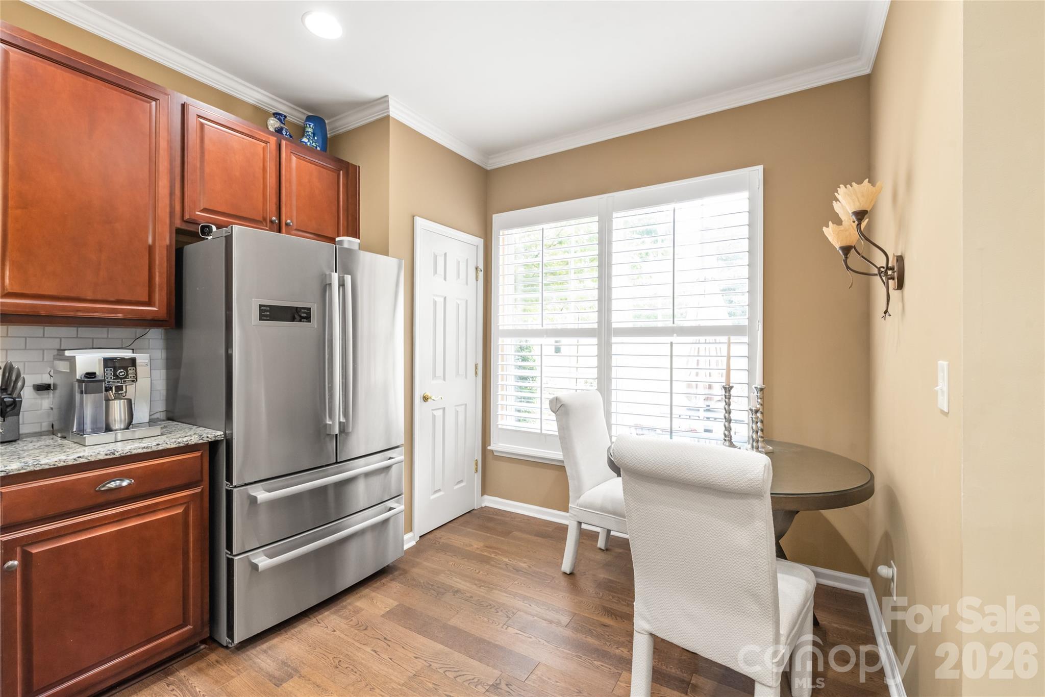 Newly installed custom plantation shutters grace ALL the windows. (2026) - 4780 Grier Farm Lane, Charlotte