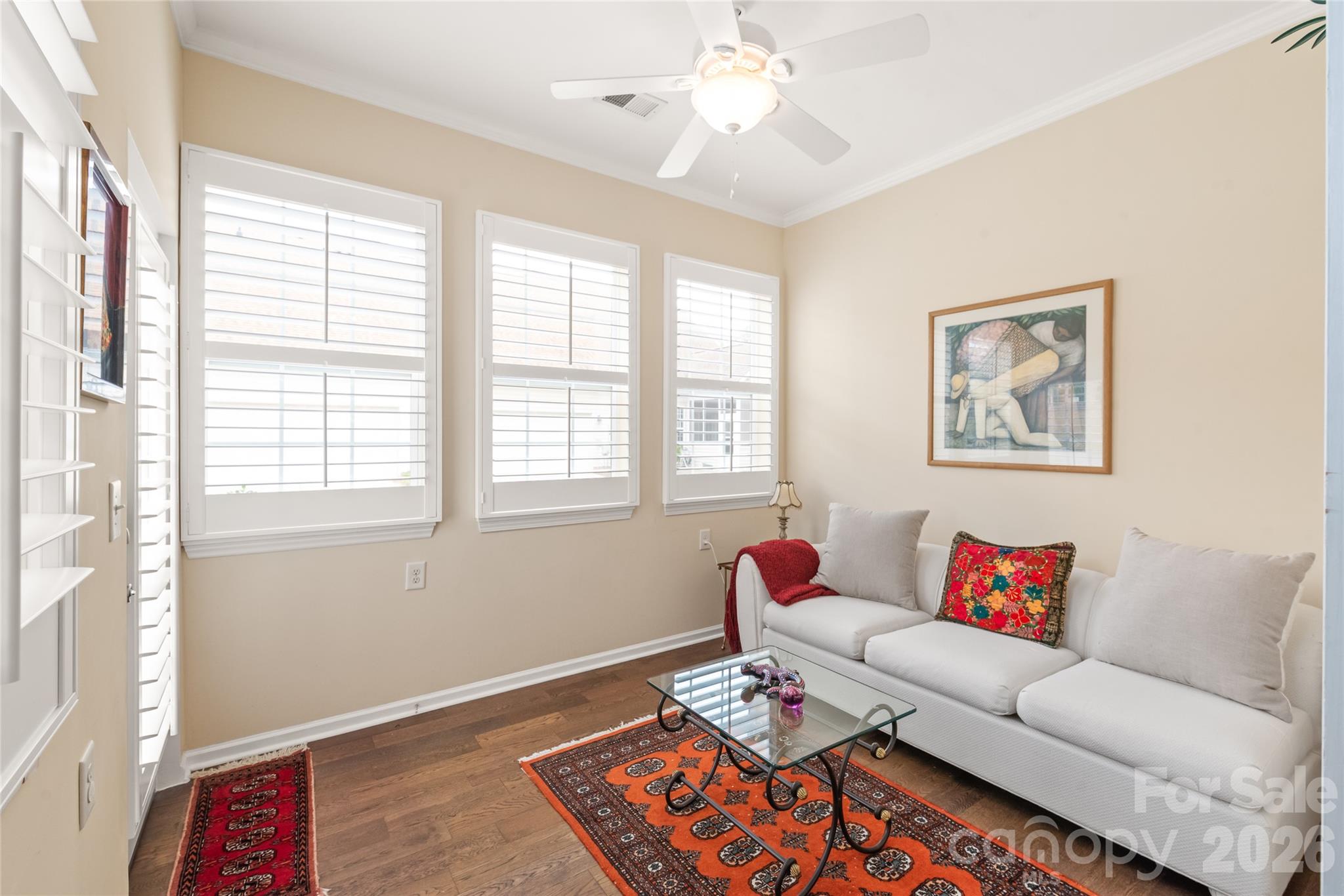 All-Seasons Sunroom: Fully heated and air-conditioned sunroom providing year-round enjoyment, leading directly out to the driveway and garage. - 4780 Grier Farm Lane, Charlotte