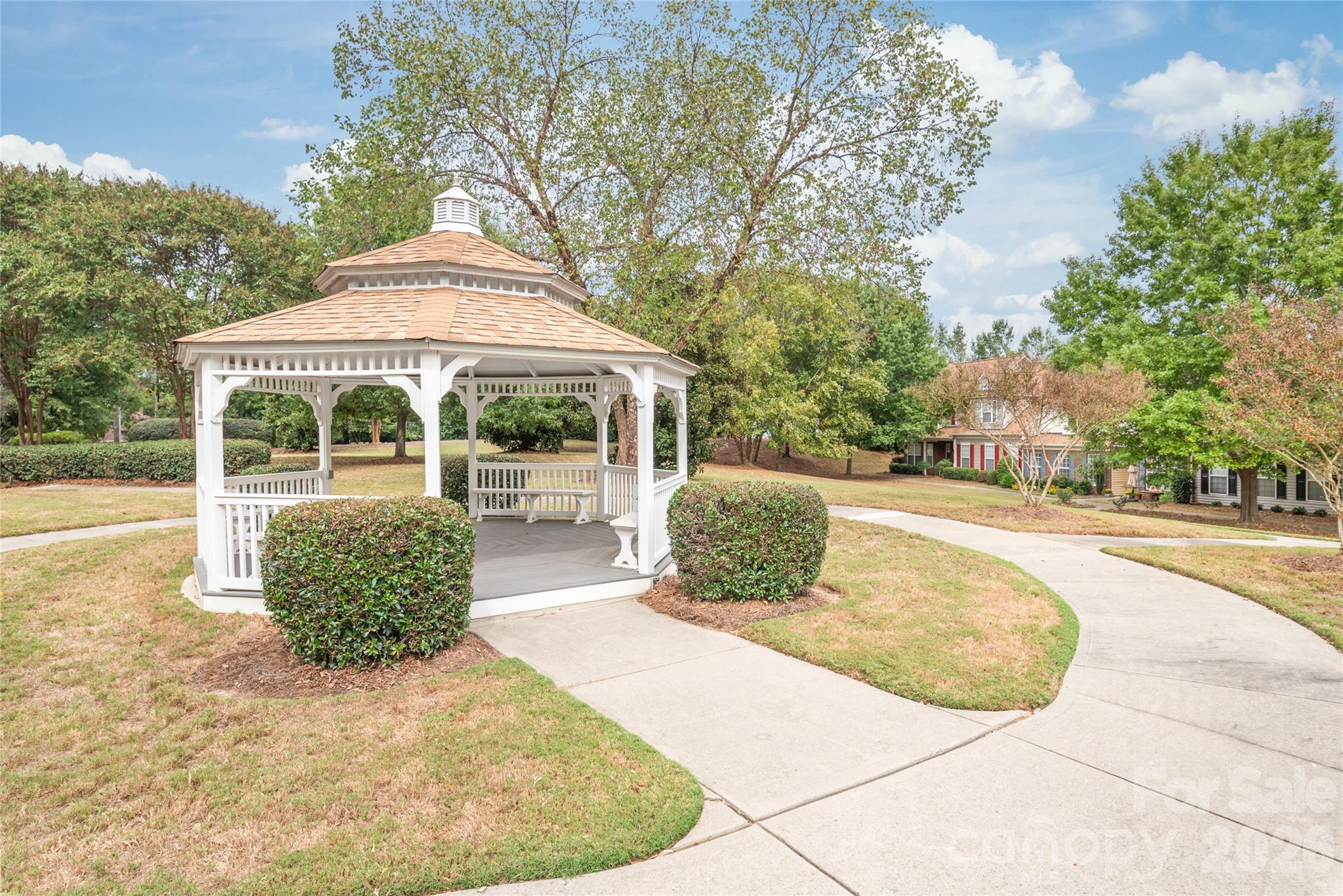 Low-Maintenance HOA: Comprehensive HOA covers full roof replacements, gutter cleaning, vinyl siding power-washing, exterior painting, lawn mowing, bush trimming, and pool maintenance. - 4780 Grier Farm Lane, Charlotte