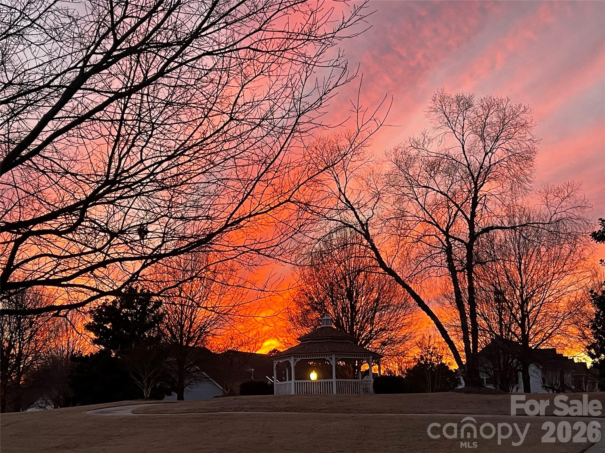 Unwind at the end of the day with front-row seats to breathtaking Carolina sunsets right from your front patio. - 4780 Grier Farm Lane, Charlotte
