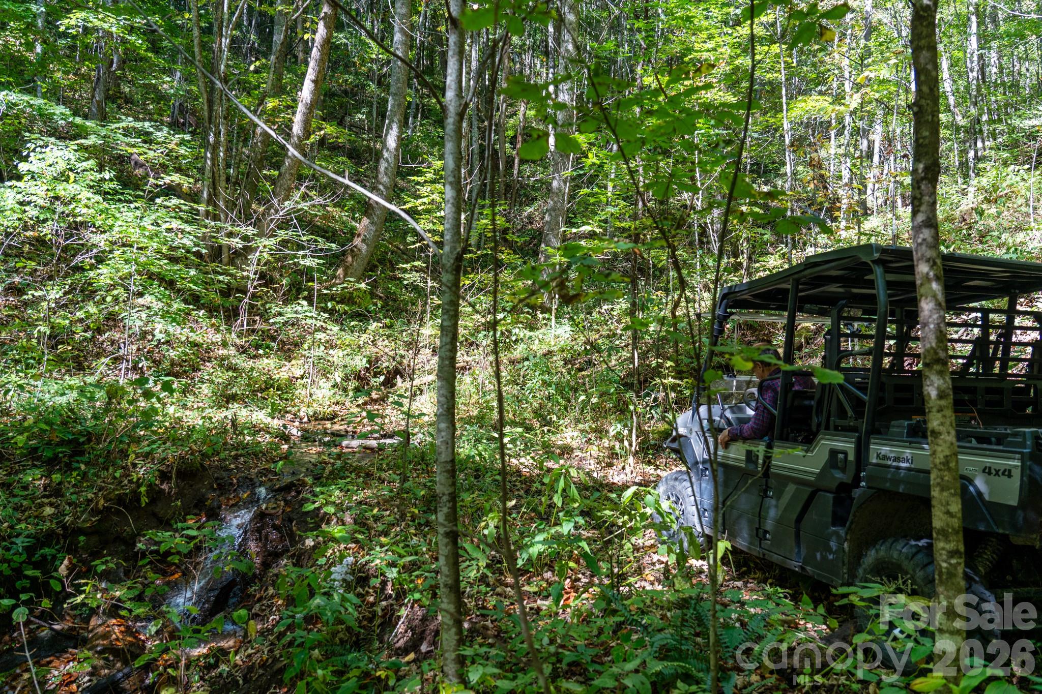 Crossing the creek on 4x4 - 00 Orion Davis Road, Waynesville