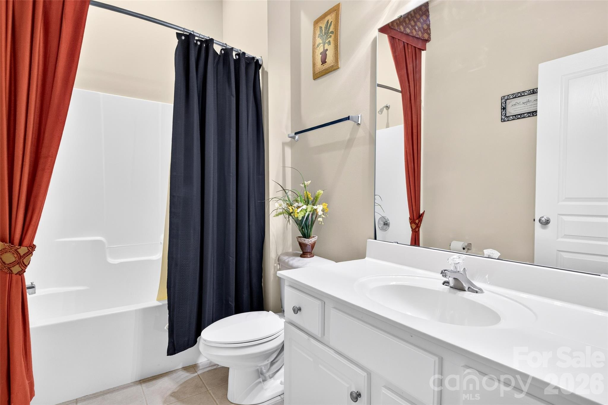 Second Full Bathroom adjacent to the 2nd bedroom with tile flooring. - 8432 Brookings Drive, Charlotte