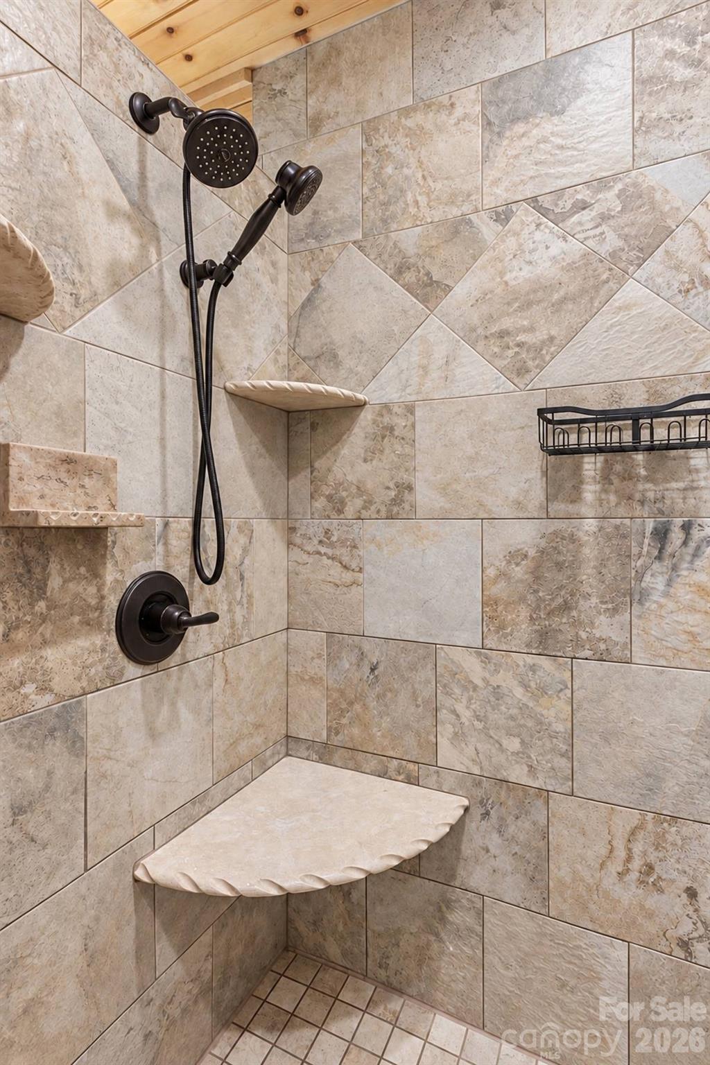 Tiled walk-in shower in the primary bath - 18 Fairway Run, Bryson City