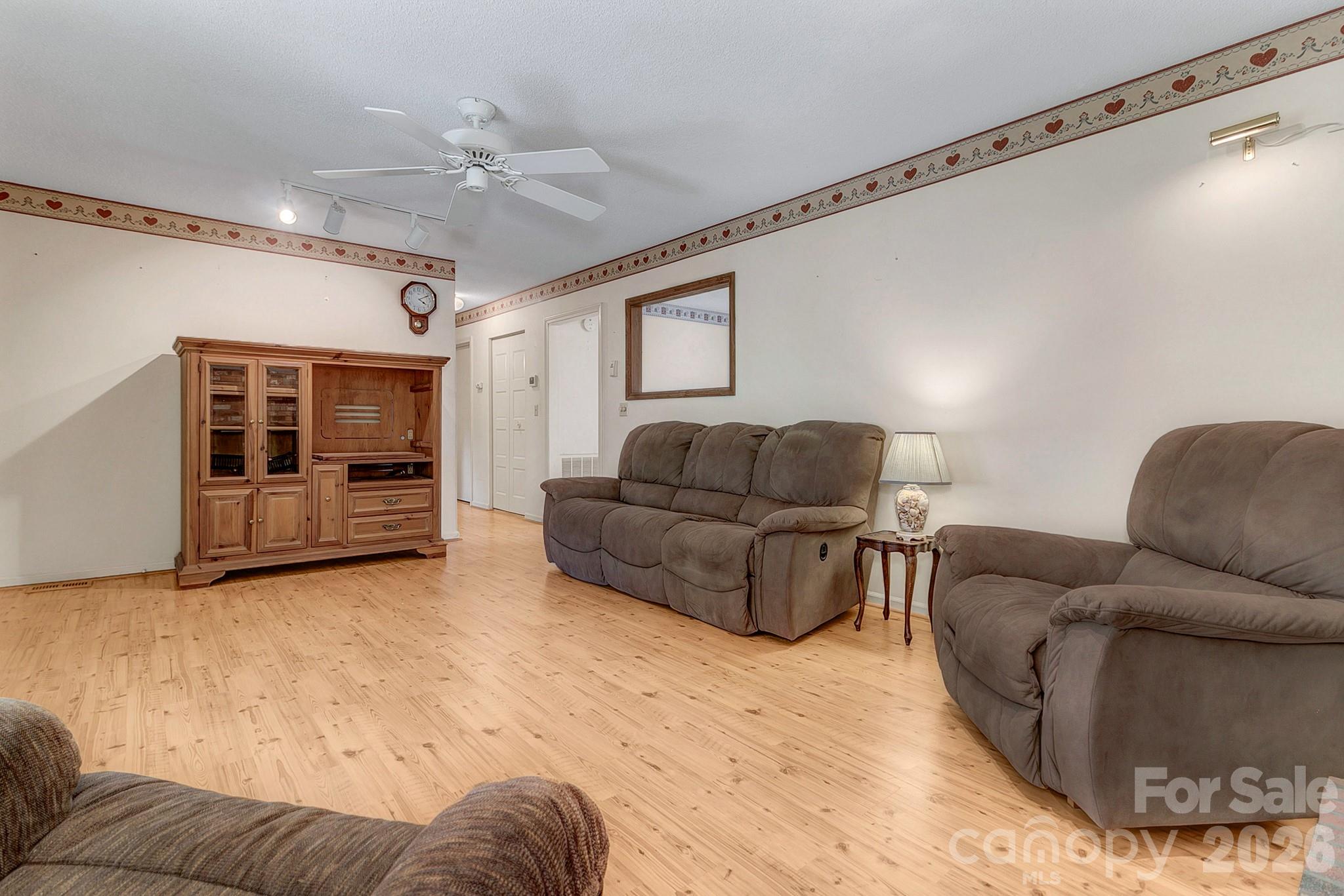 Great room looking into hallway & kitchen access - 1 Dewberry Drive, Hendersonville