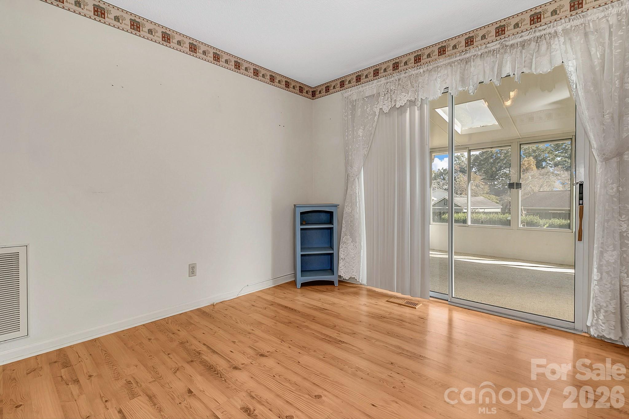 Dining area w/sunroom access - 1 Dewberry Drive, Hendersonville