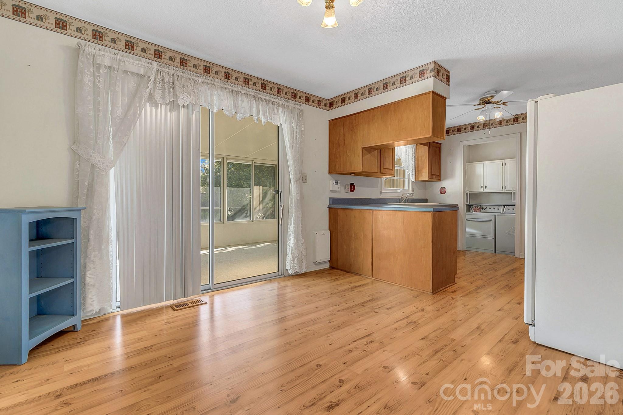 Dining area outside of kitchen w/sunroom access - 1 Dewberry Drive, Hendersonville