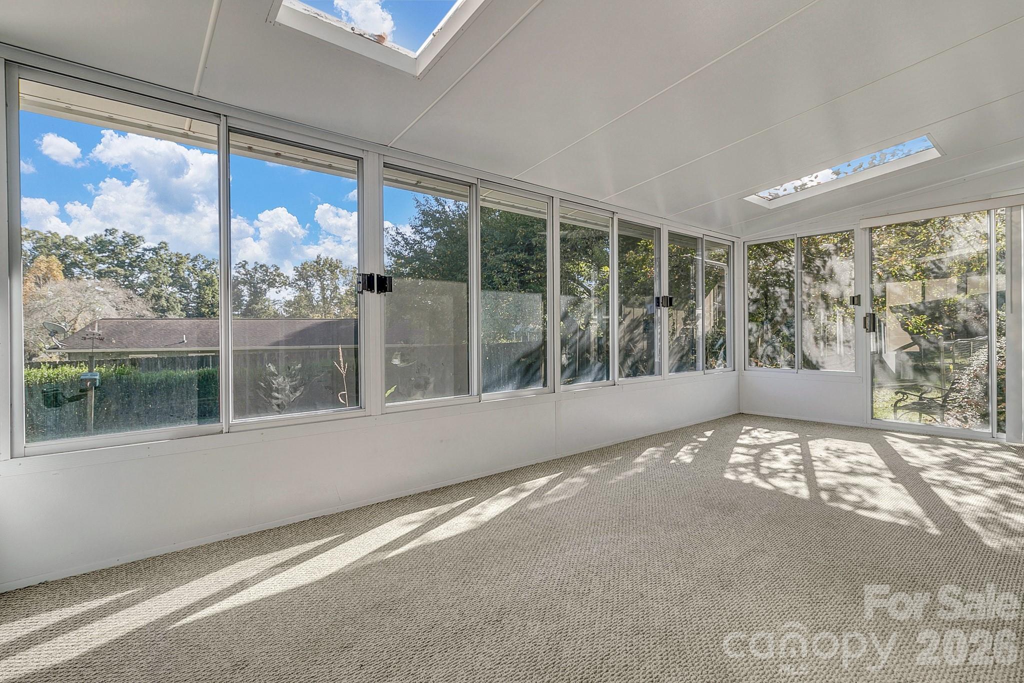 Sunroom with skylights & natural light - 1 Dewberry Drive, Hendersonville
