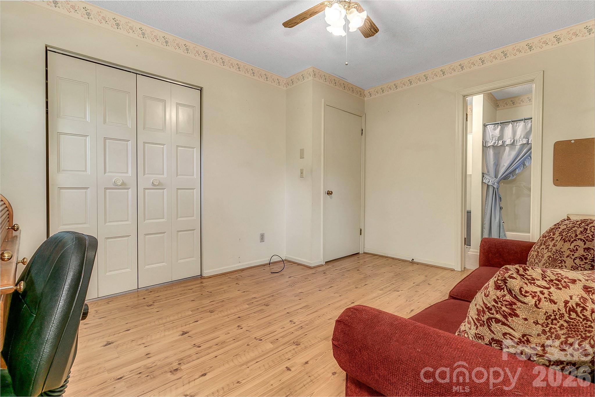 2nd bedroom w/walk-in closet & ceiling fan - 1 Dewberry Drive, Hendersonville