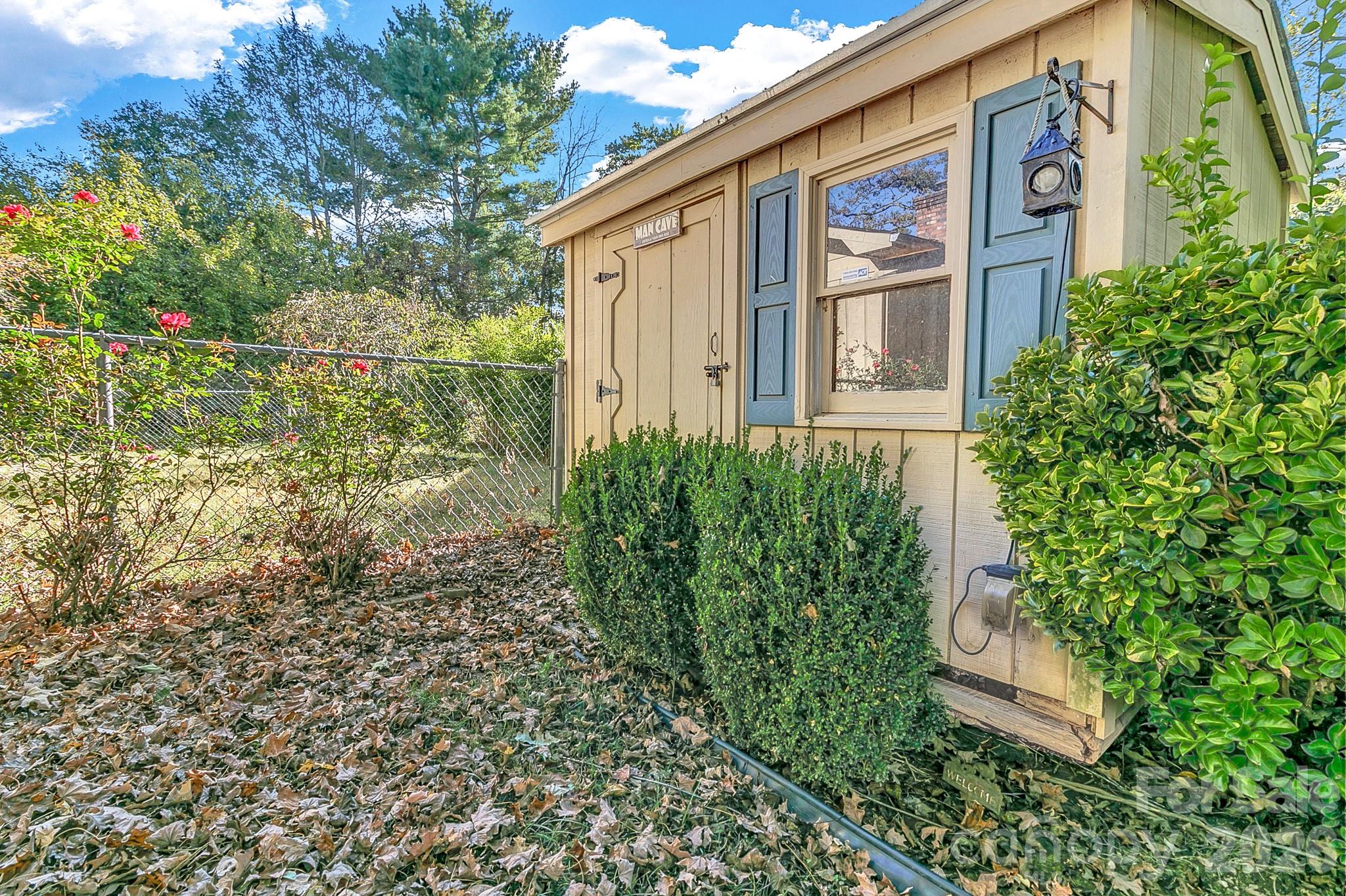 Shed in back yard w/storage capacity - 1 Dewberry Drive, Hendersonville