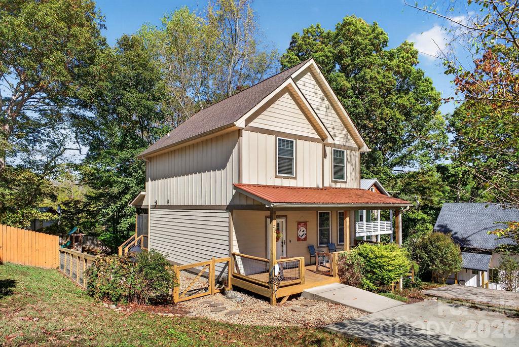 Completely fenced, this yard is awesome for pups and entertaining! - 98 Langwell Avenue, Asheville