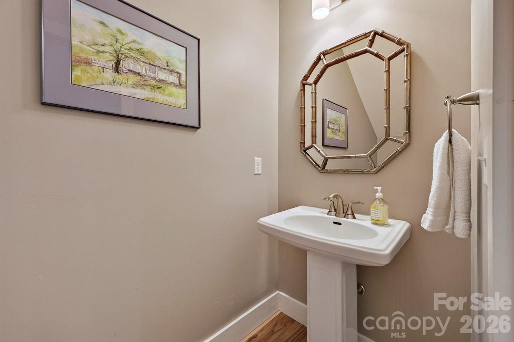 Half bath right off the living and kitchen area... - 98 Langwell Avenue, Asheville