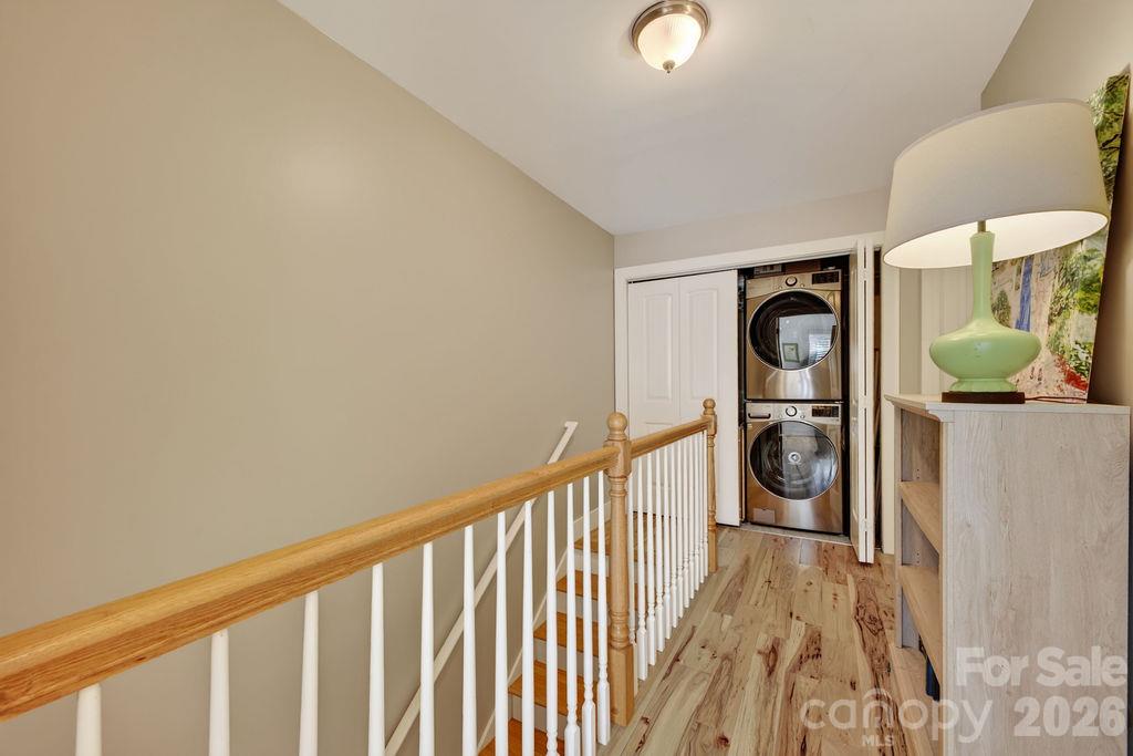 A spacious hallway allows for furniture and easy access to the laundry! - 98 Langwell Avenue, Asheville