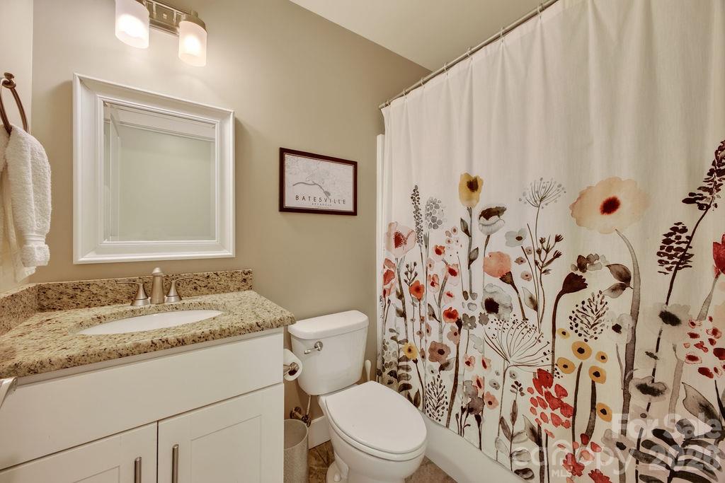 Hall bath on the second floor shared by both secondary bedrooms... - 98 Langwell Avenue, Asheville