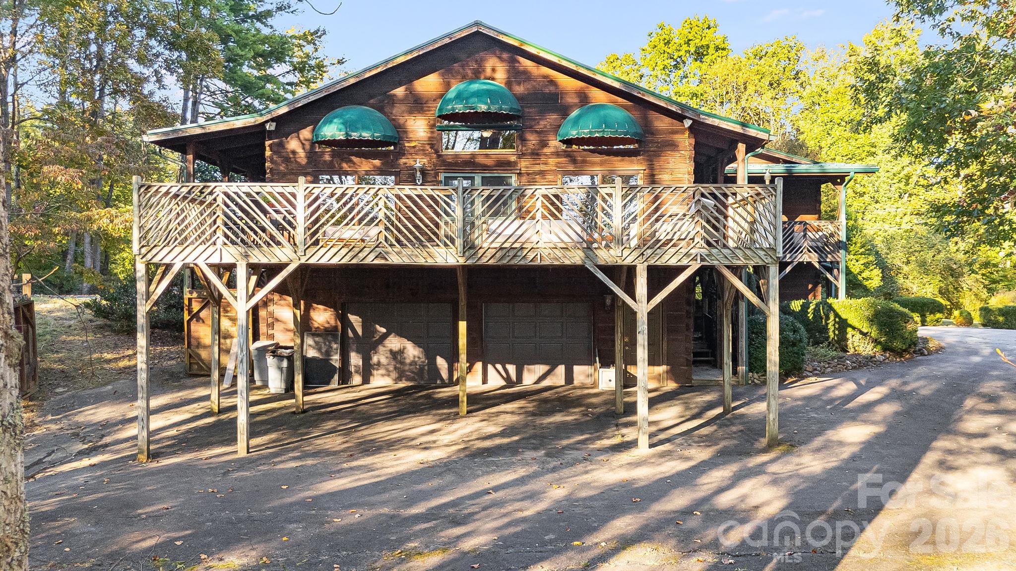 Wraparound Deck and oversized 2 car garage. Tons of driveway parking - 104 Paramount Drive, Leicester