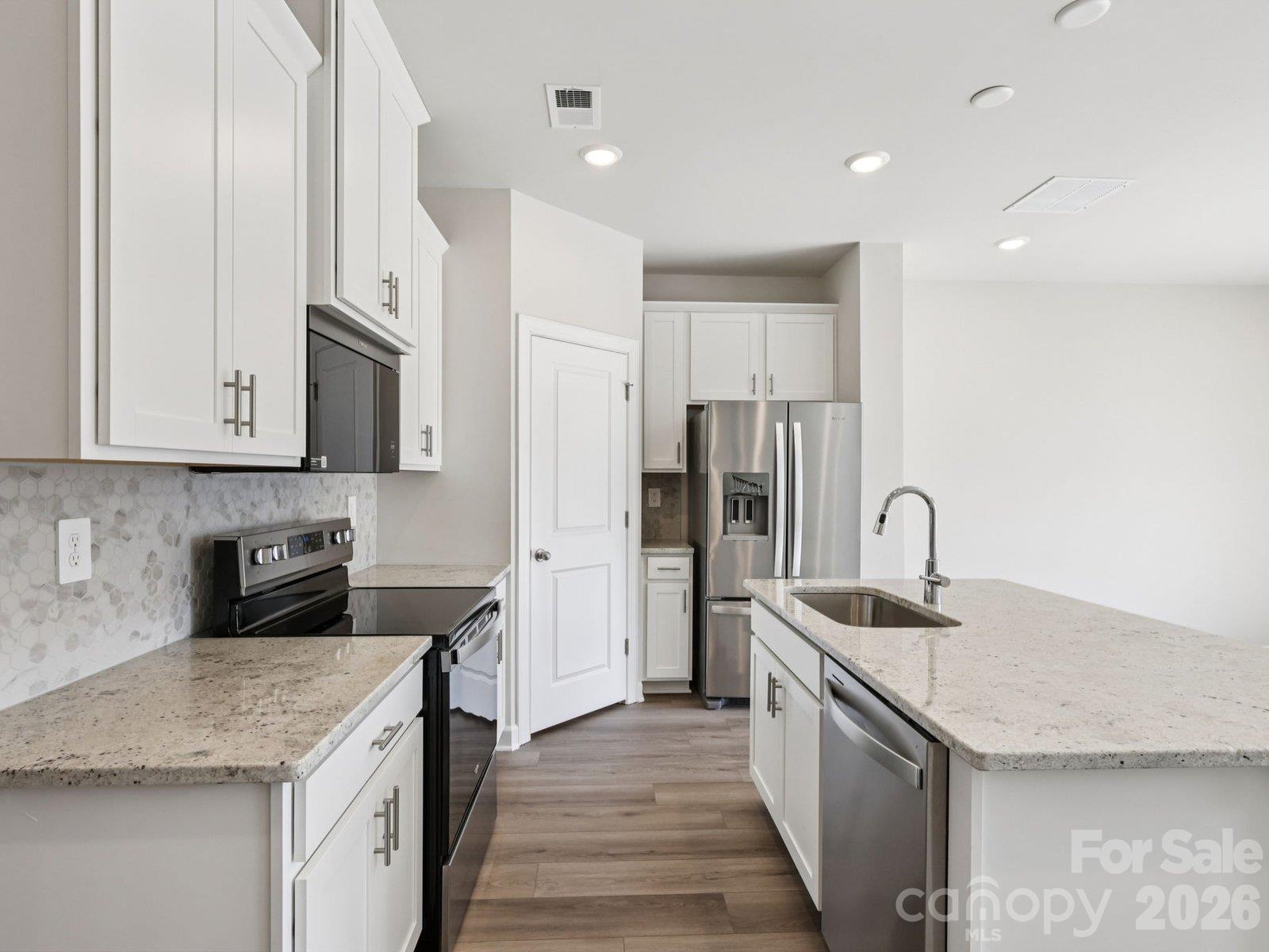 Photos are not of the actual home, but are photos of the builder home with same floorplan with similar interior finishes. - 8013 Hidden Springs Drive, Charlotte