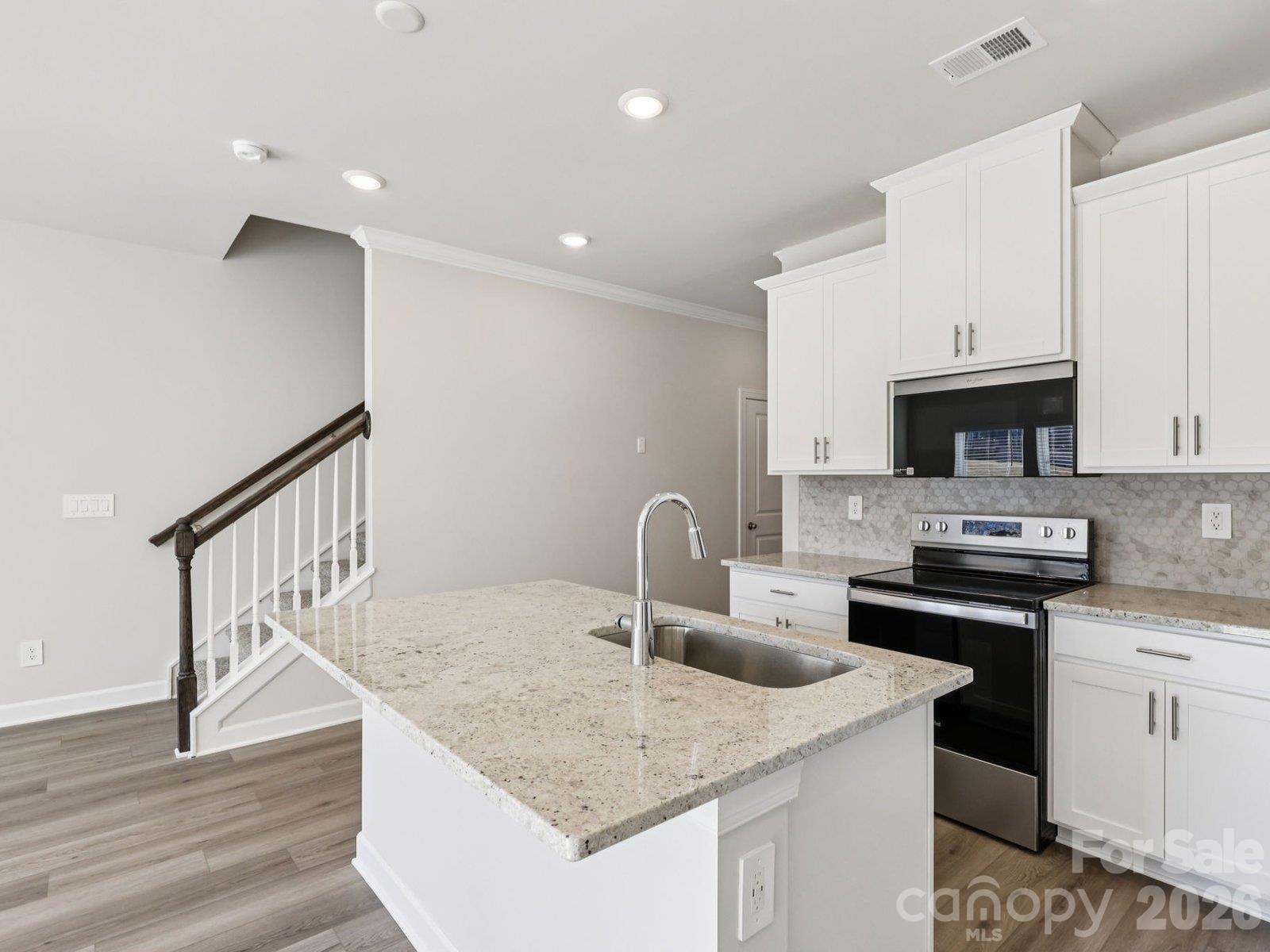 Photos are not of the actual home, but are photos of the builder home with same floorplan with similar interior finishes. - 8013 Hidden Springs Drive, Charlotte