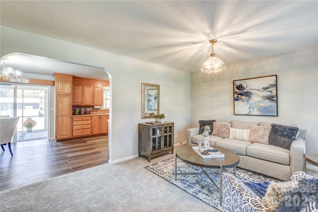 Living room opens to eat in kitchen - 311 Bell Road, Kings Mountain
