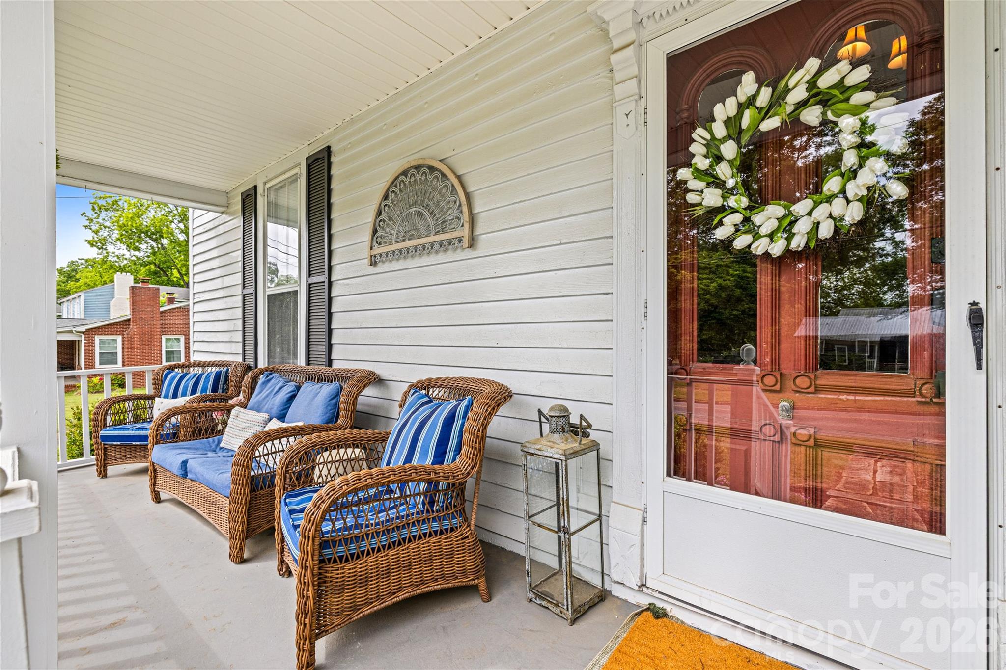 Welcoming covered front porch offers the perfect spot to relax and enjoy the neighborhood. - 231 E Jefferson Street, York