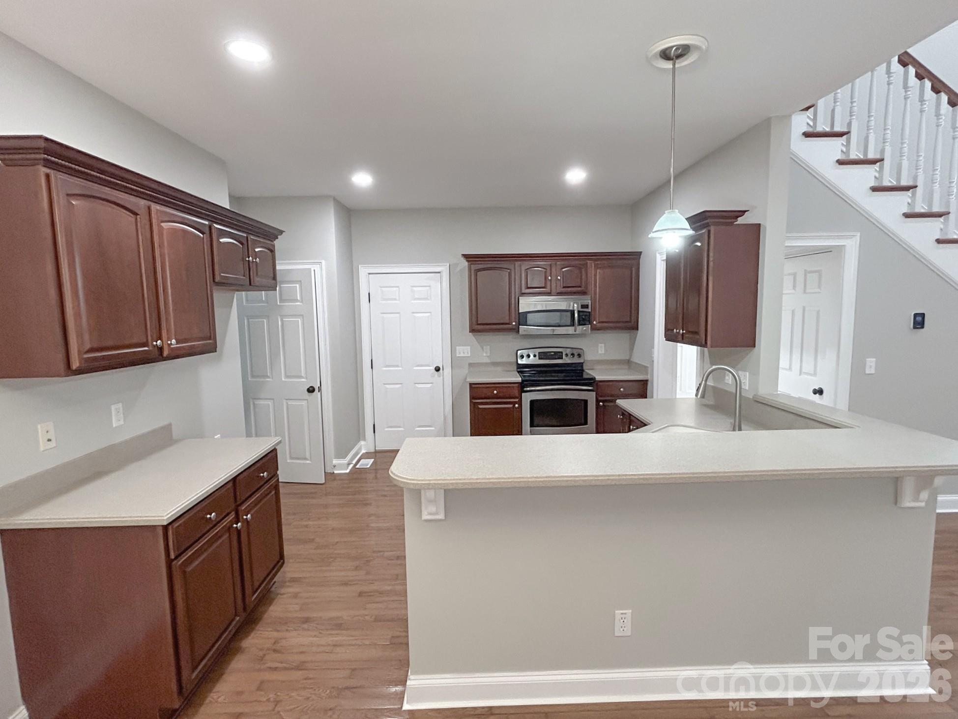 Breakfast bar into Kitchen - 201 Colonel Holcombe Place, Candler
