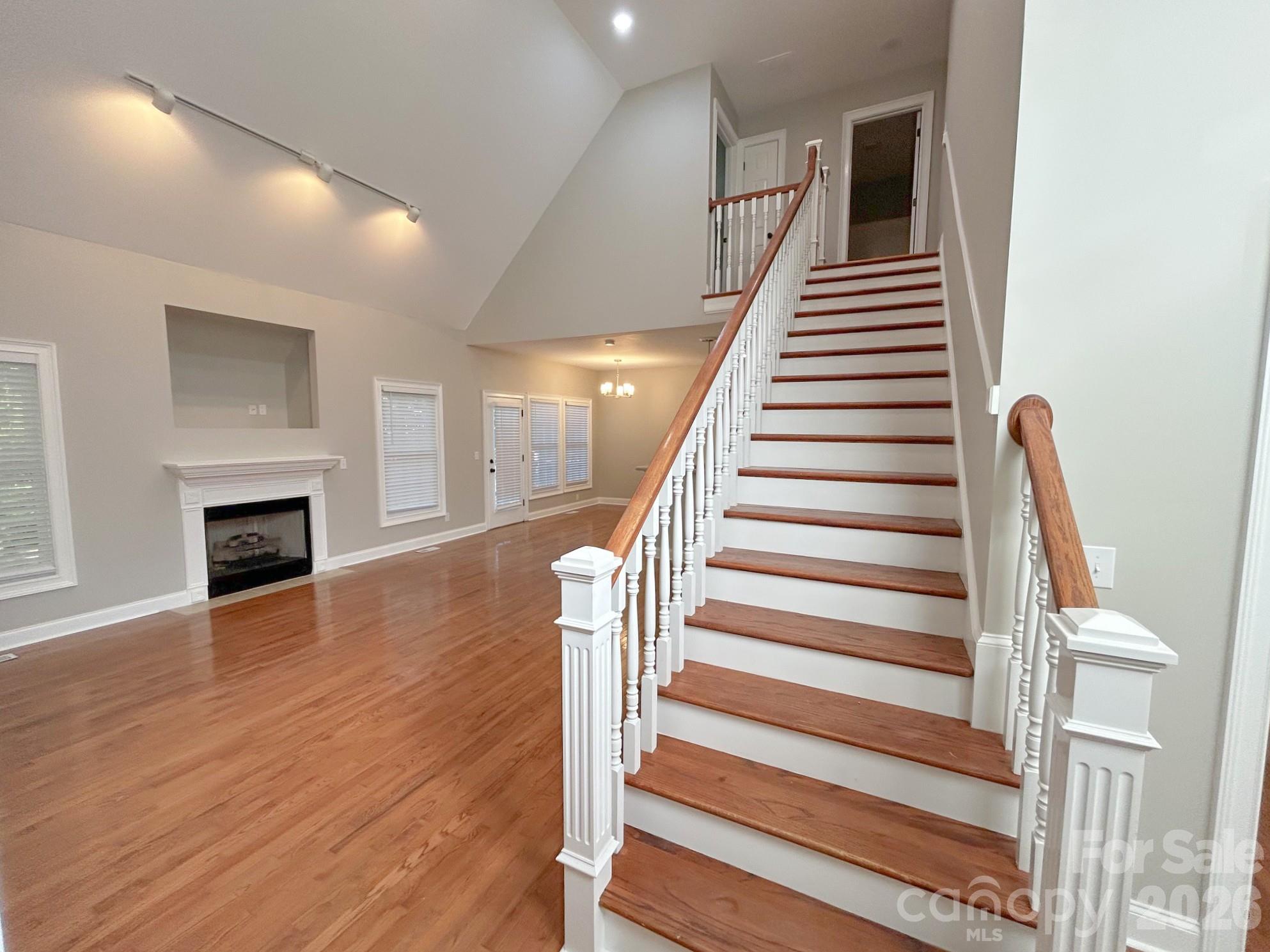 Great room with stairs to upper level - 201 Colonel Holcombe Place, Candler