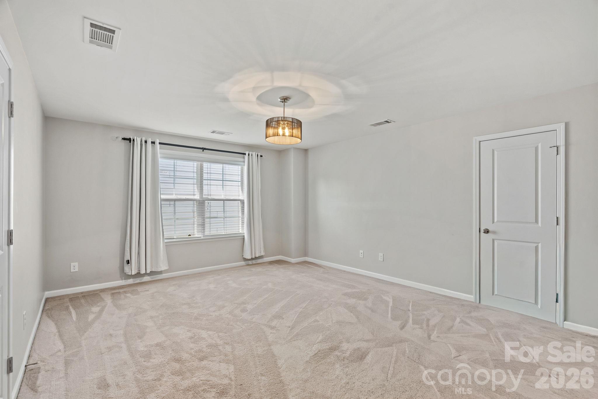 Upper level loft with walk-in attic access - 11237 Black Brant Lane, Charlotte