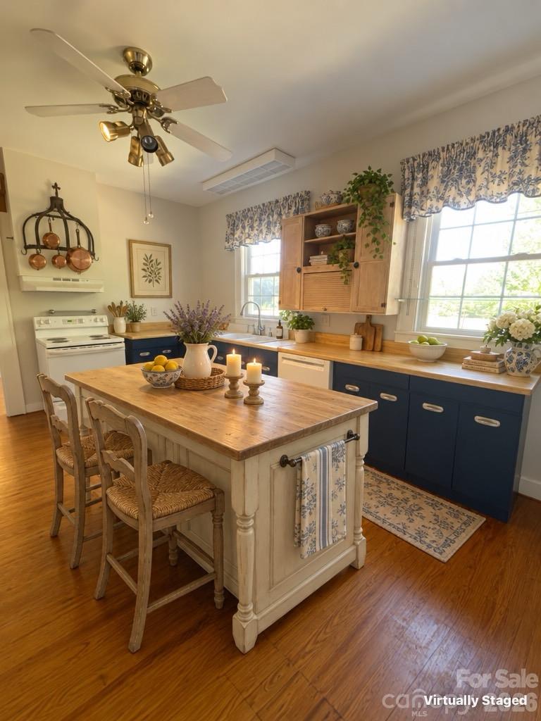 Kitchen - virtually staged with island - 1220 Williams Road, Fort Mill