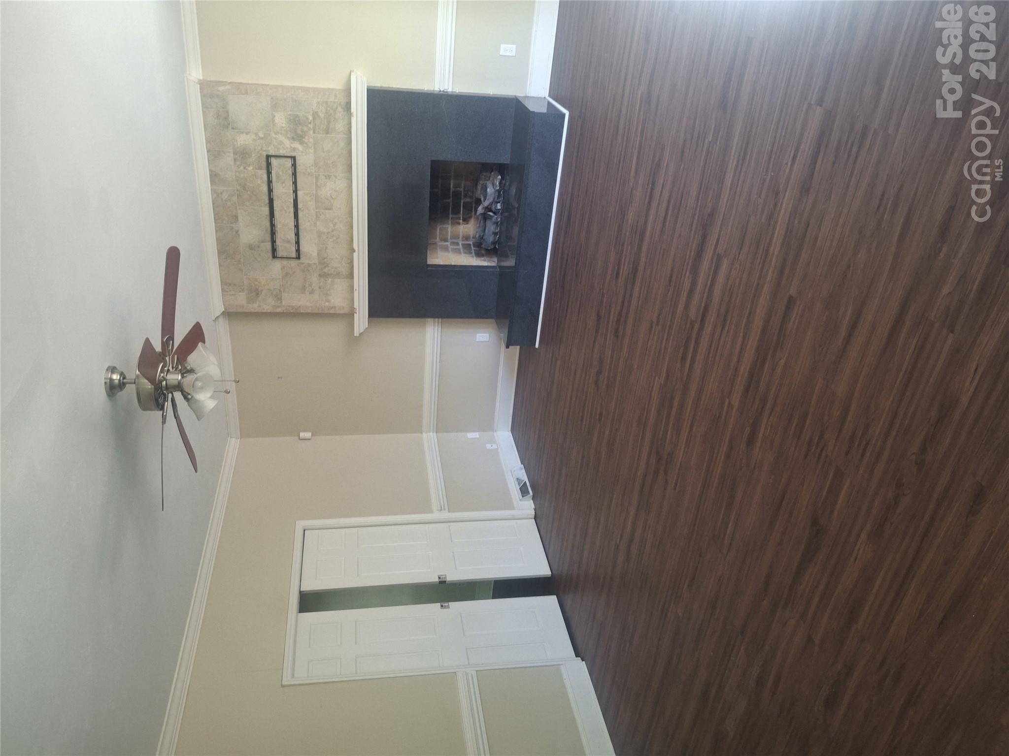 Family room with pocket doors - 9327 Willowglen Trail, Charlotte