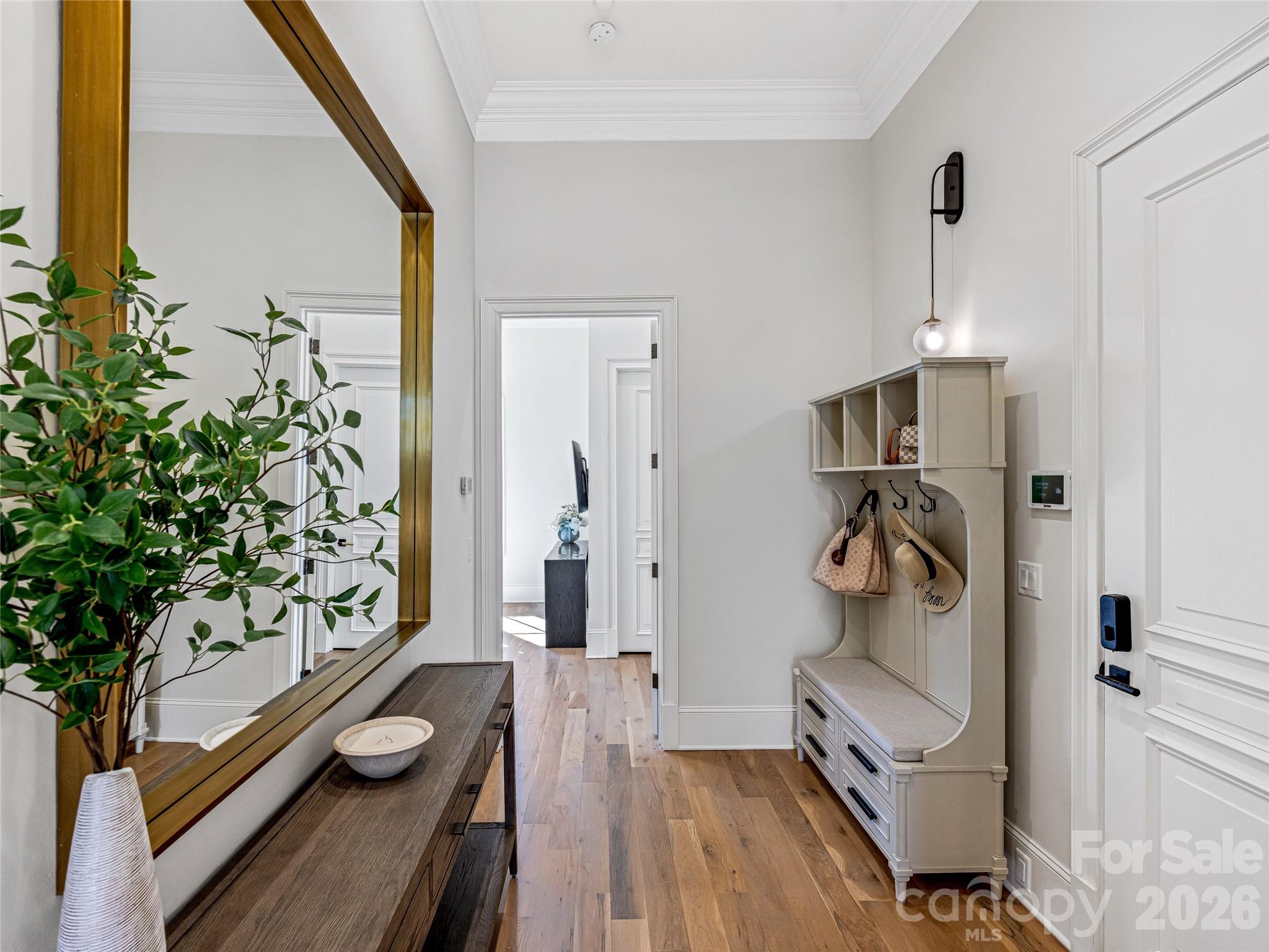 Hallway leading to additional guest bedroom on main level. - 1905 White Tree Trail, Arden