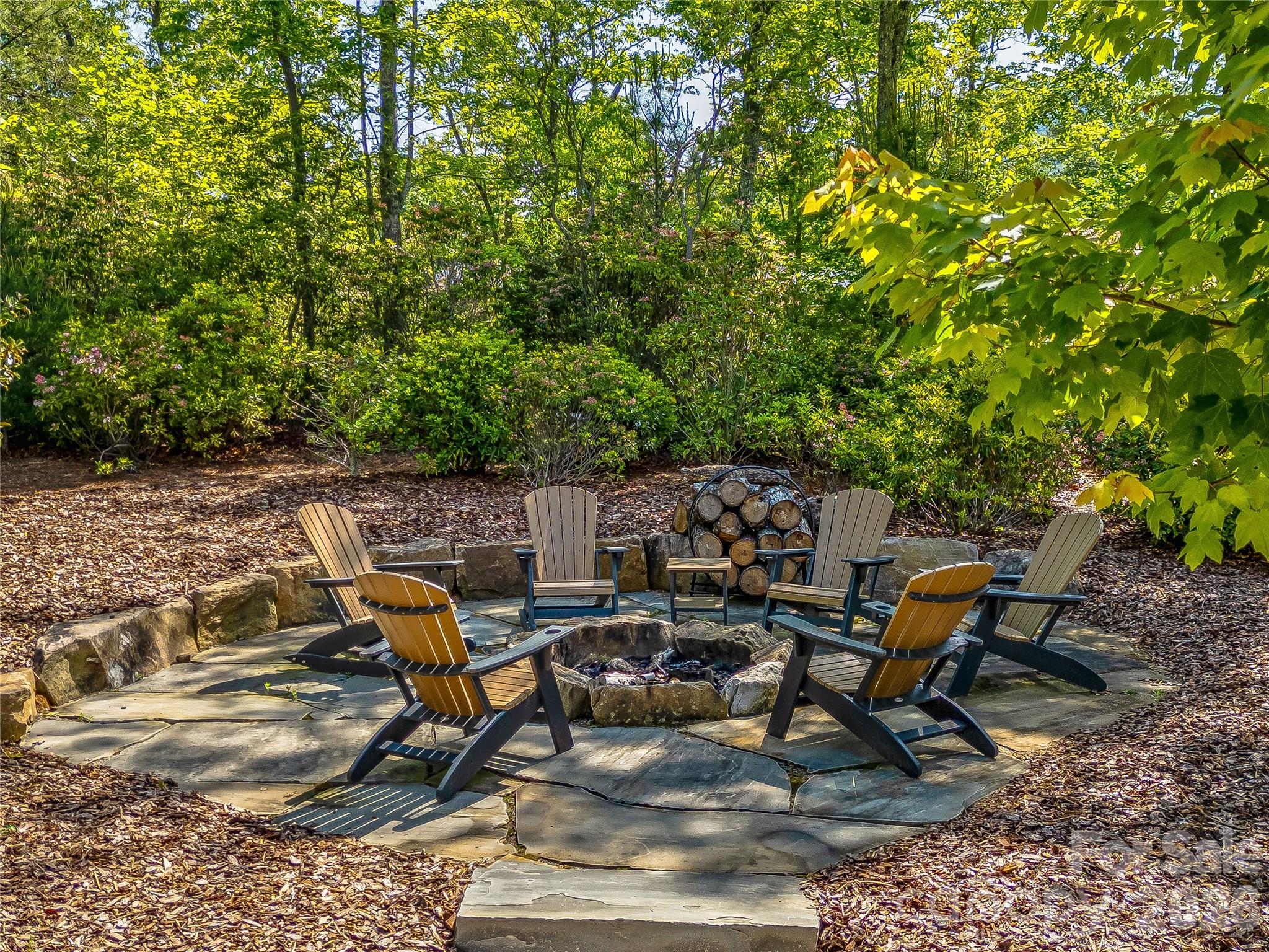 1 of 2 custom firepits on the property. Great entertaining or relaxing space - 1905 White Tree Trail, Arden