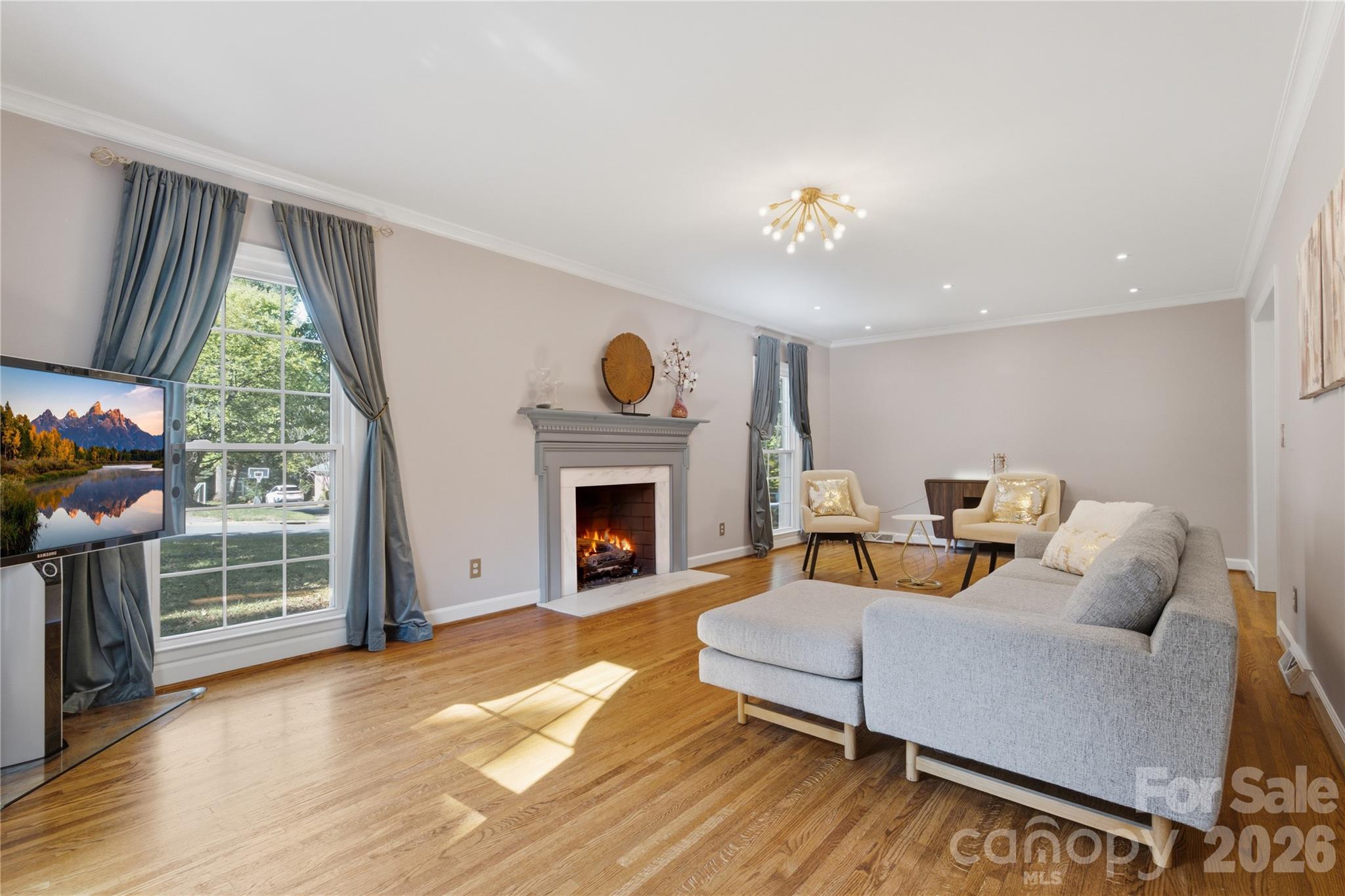 Formal living room with gas logs - 1200 Charter Place, Charlotte