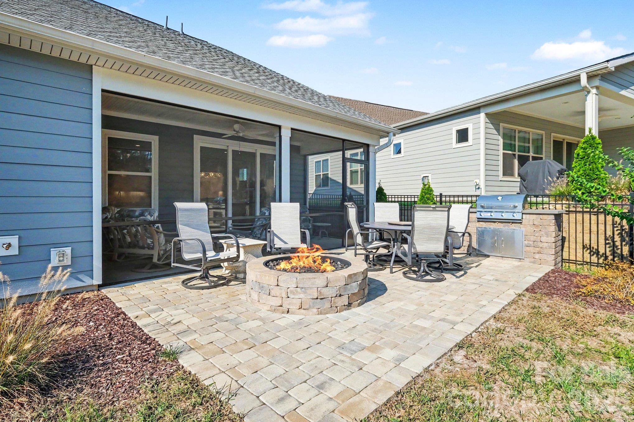 Back yard Patio features gas fire-pit and gas grill - 5605 Caneel Lane, Denver