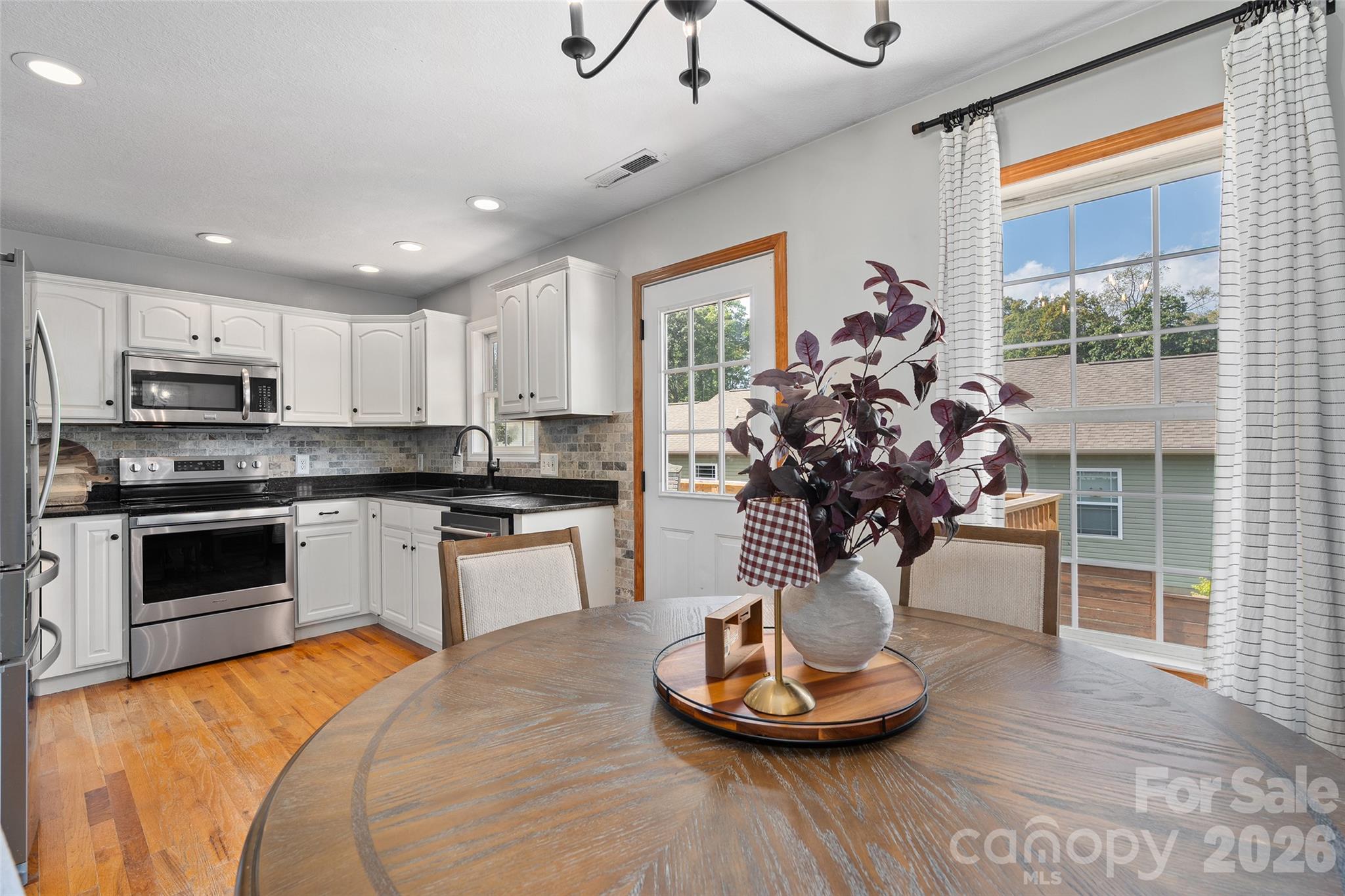Single Family Residence at 231 Morgan Road, Candler, photo 10 of 24