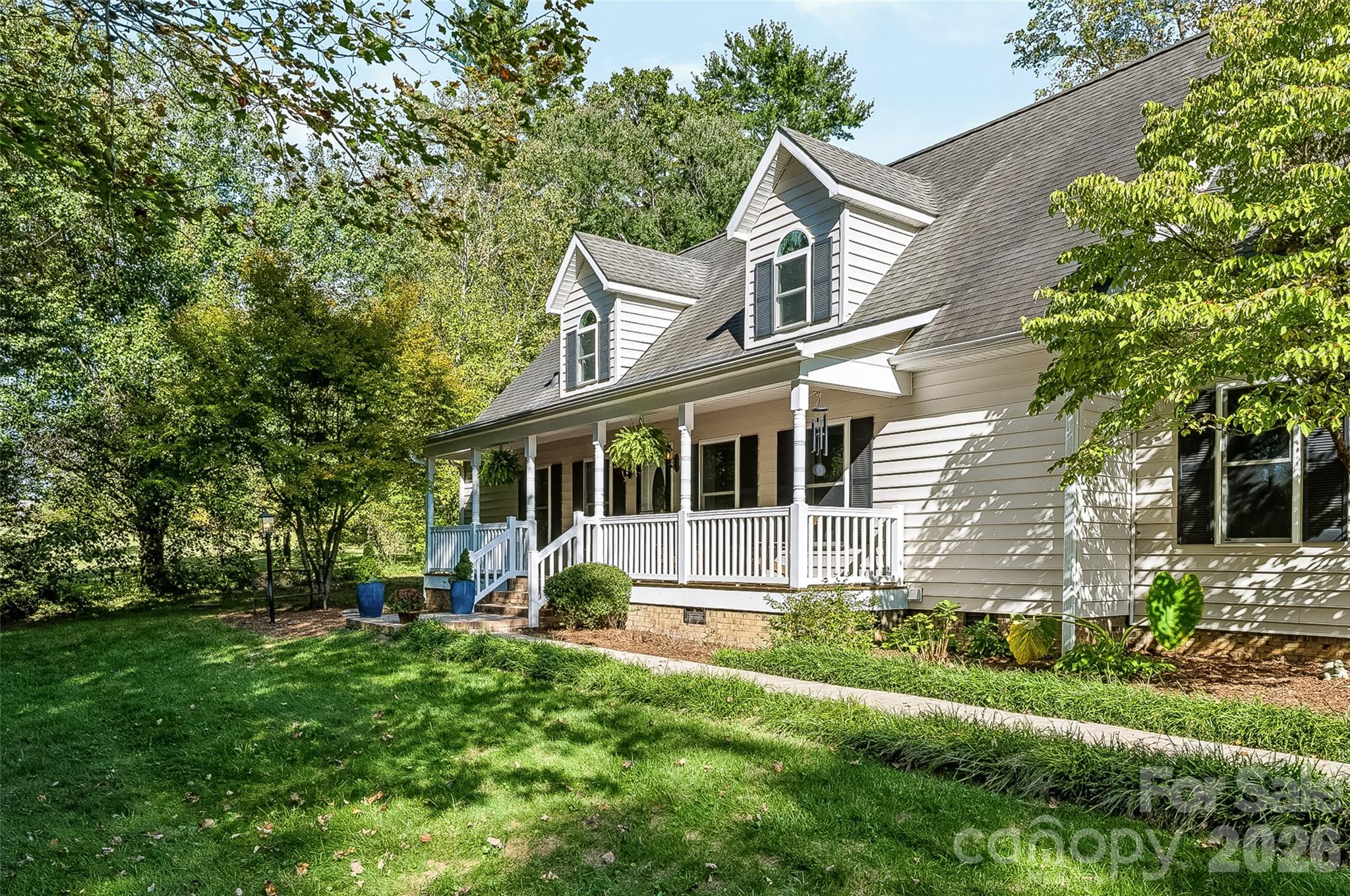 Side view of front porch from the driveway - 2122 N Rugby Road, Hendersonville