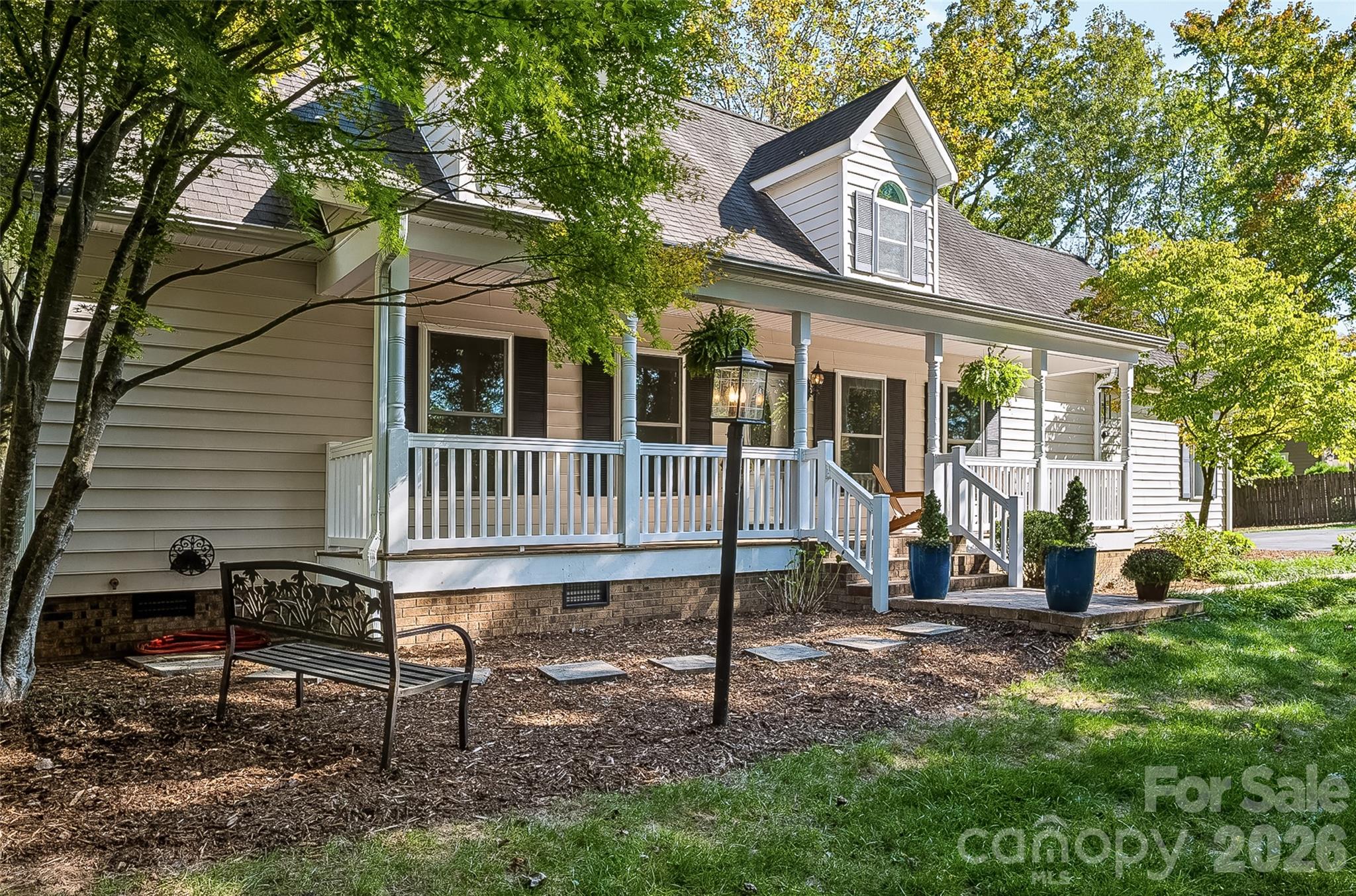 Side view of front porch - 2122 N Rugby Road, Hendersonville