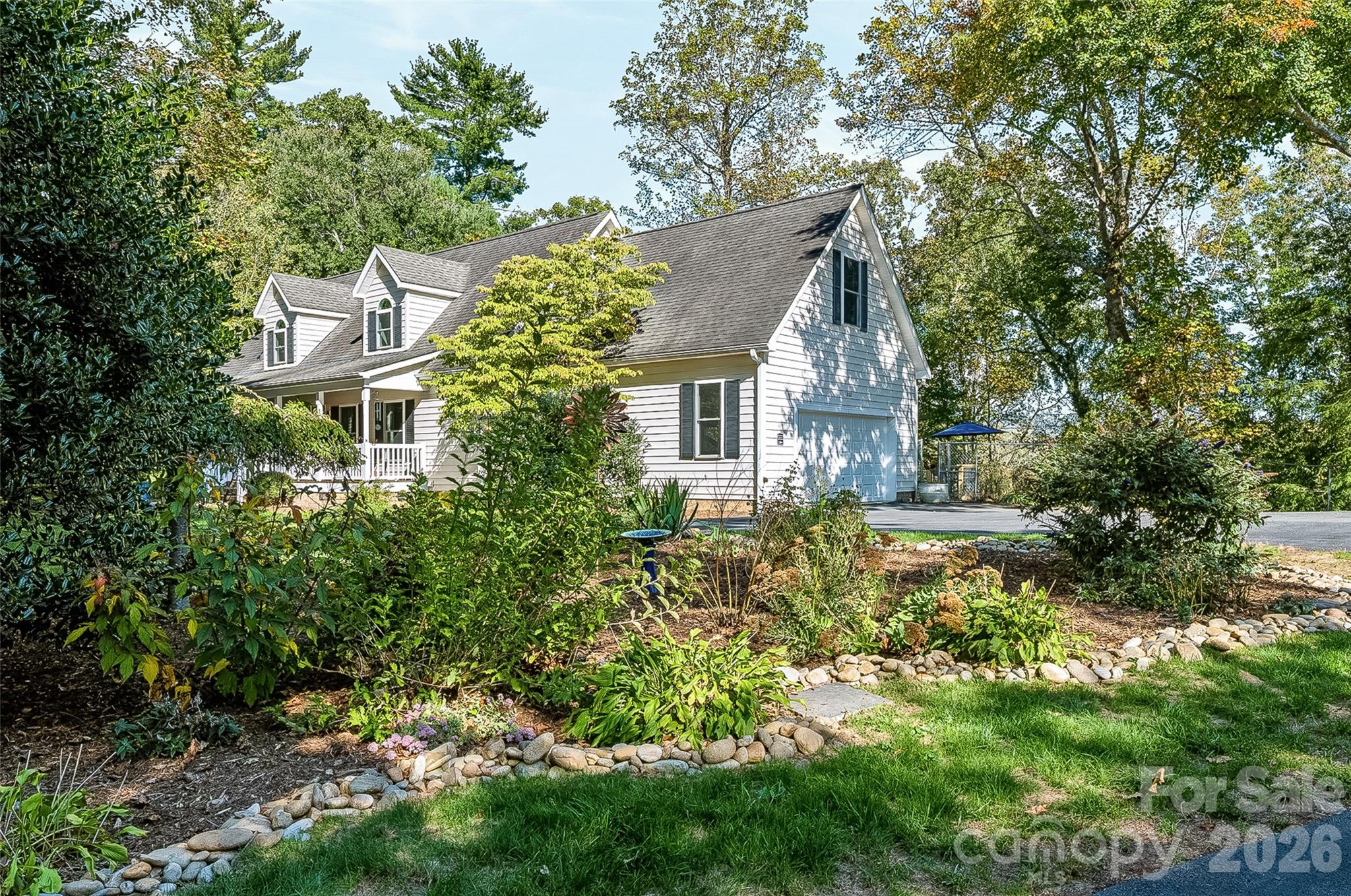 View of the home from the driveway - 2122 N Rugby Road, Hendersonville