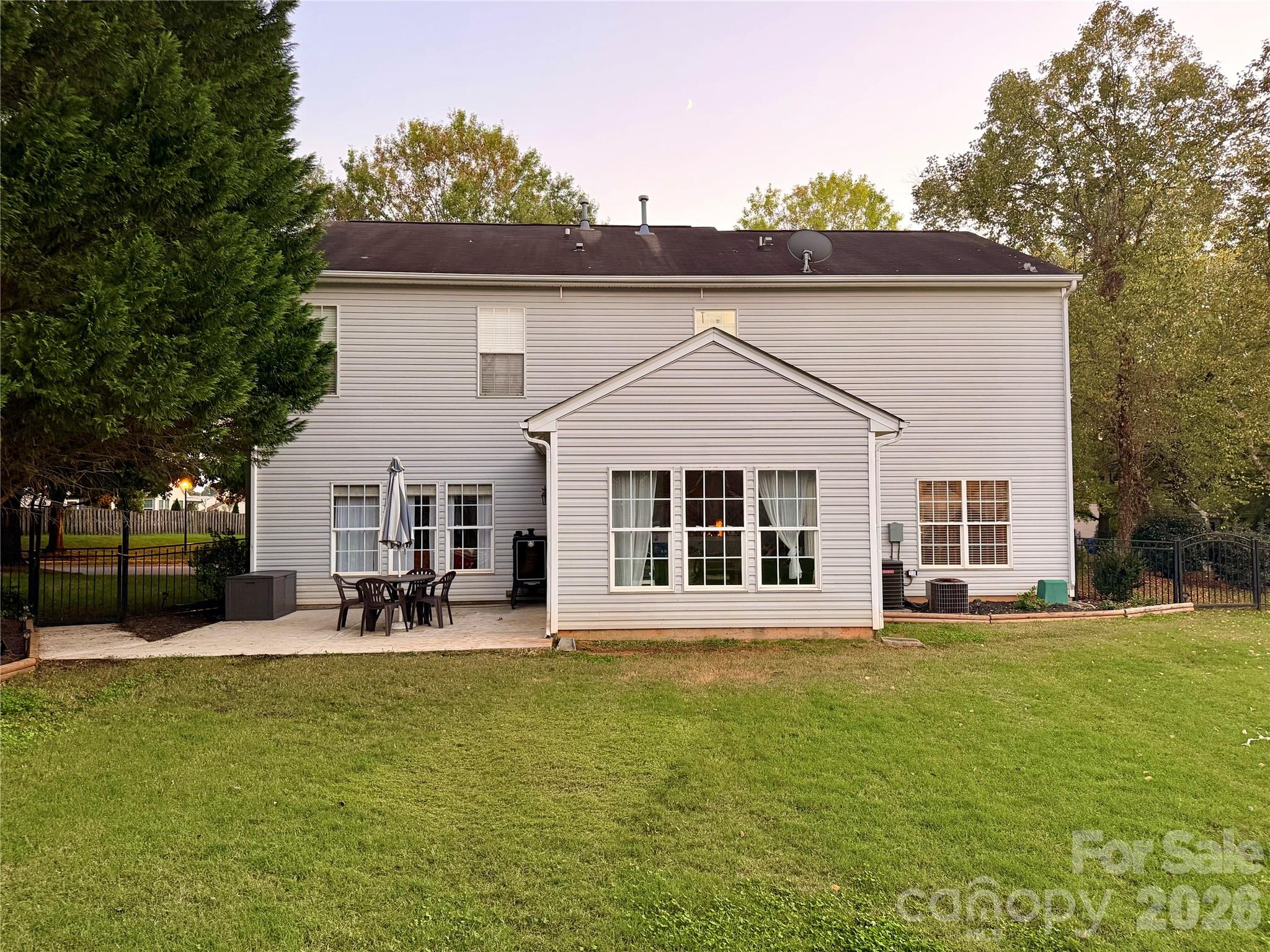 Fully fenced backyard with storage building - 120 Centerpoint Drive, Mooresville