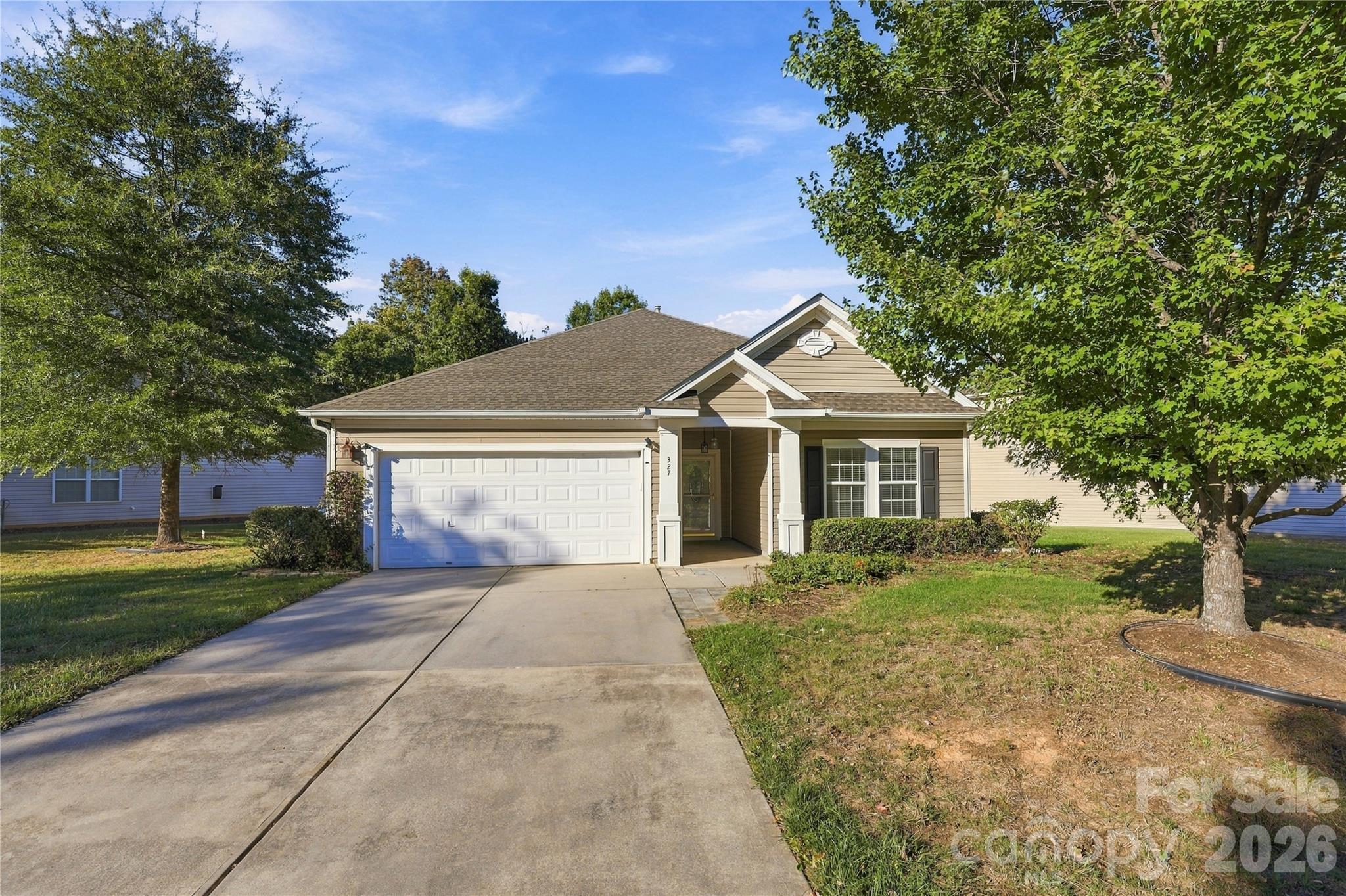 All the living is on one level, with a two-car garage for parking and storage. - 327 Annaberg Lane, Monroe