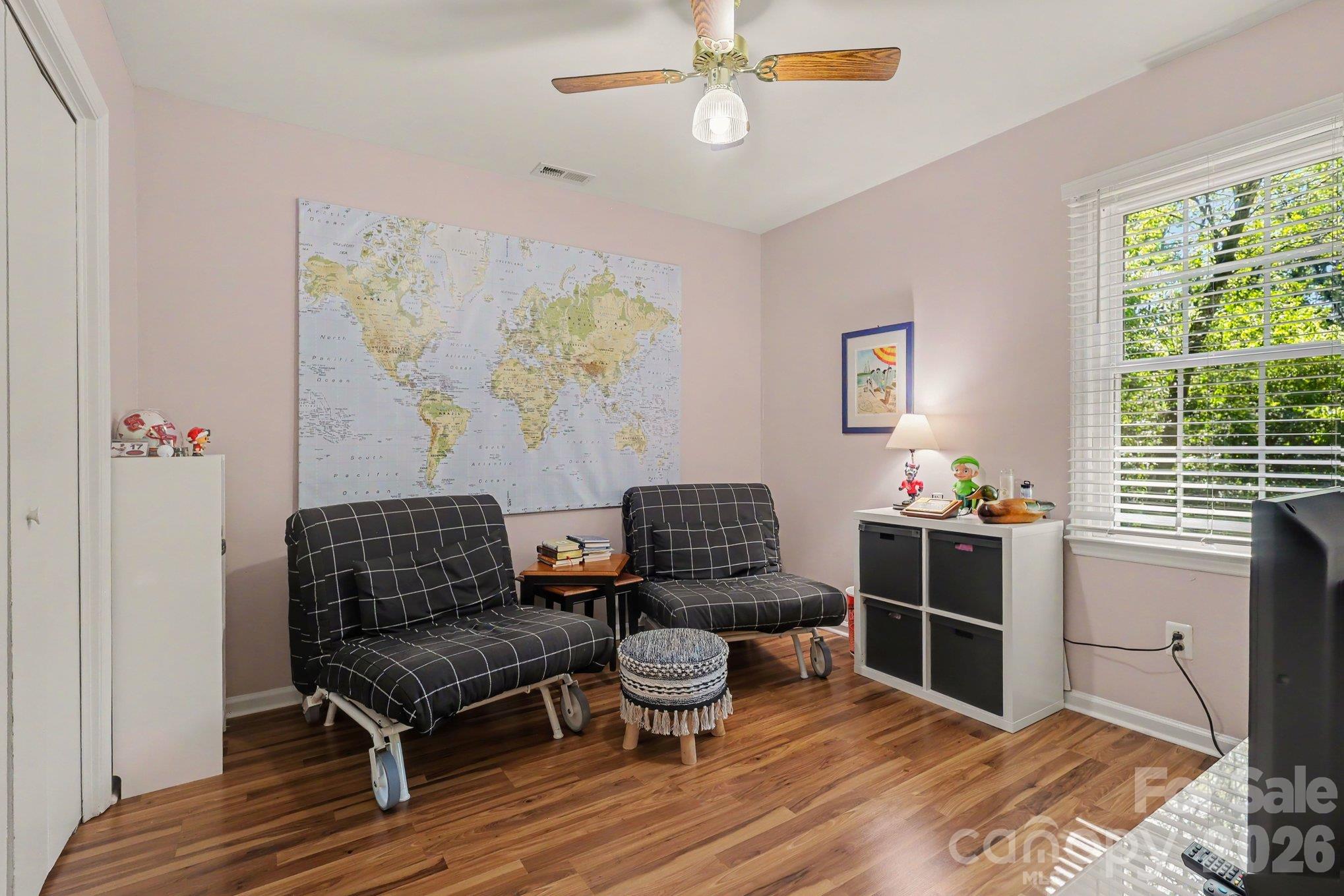 Third bedroom features a view of the private backyard where nature is the view. - 640 Heather Lane, Charlotte