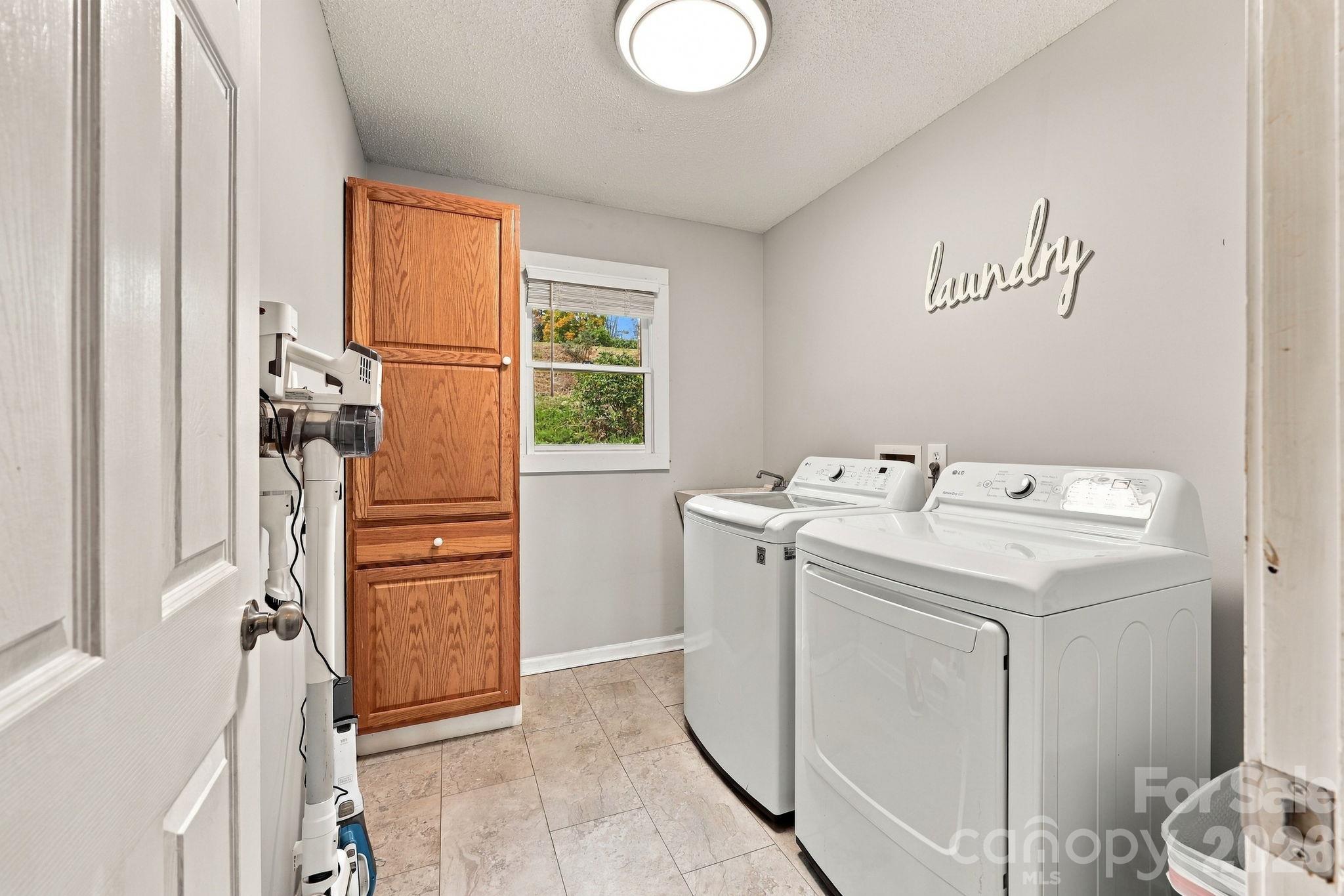 Main level laundry room - 441 Country Drive, Mars Hill