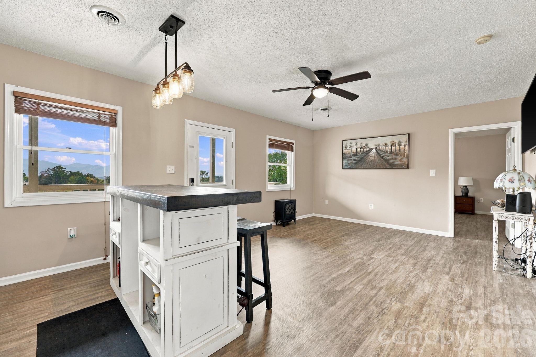 Finished lower level with entrances from garage and lower deck - 441 Country Drive, Mars Hill