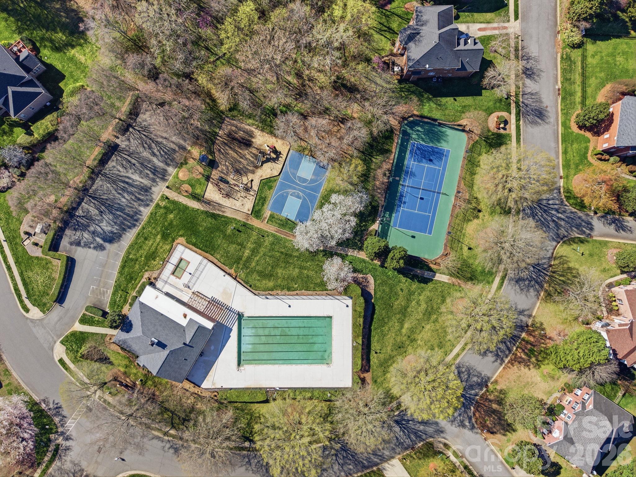 Community Pool, Tennis/Pickleball courts, Basketball court, and playground area. - 5704 Snapdragon Lane, Huntersville